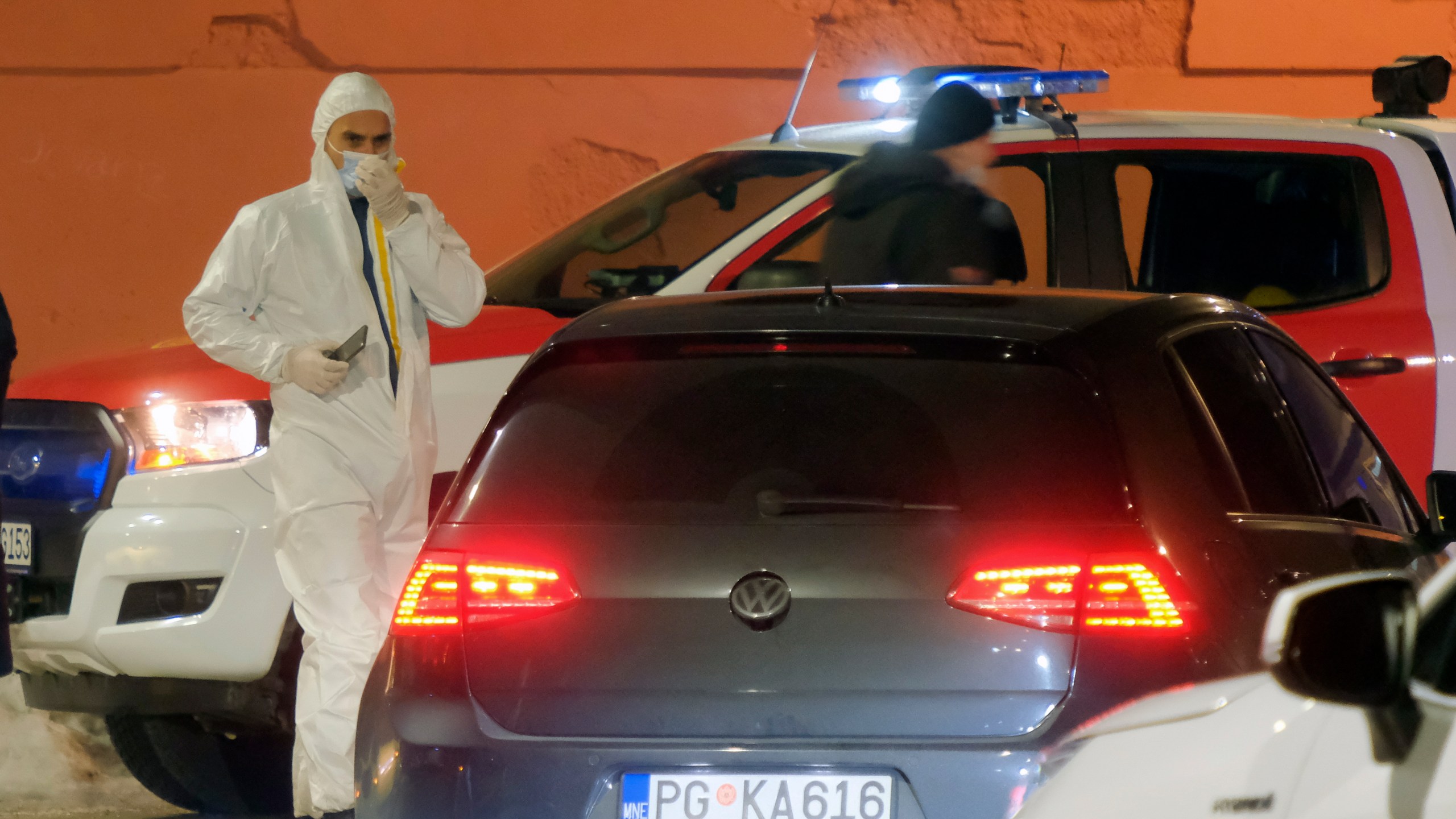 Police investigators work at the site of a shooting in Cetinje, 36 kilometers (22 miles) west of Podogrica, Montenegro, Wednesday, Jan 1, 2025. (AP Photo/Risto Bozovic)