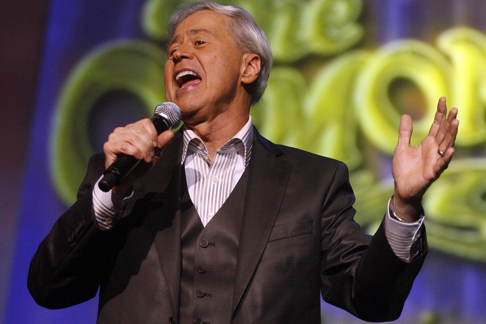 FILE - Wayne Osmond performs during a taping of the Osmonds 50th anniversary show at the Orlean's casino in Las Vegas on Tuesday, Aug. 14, 2007. (AP Photo/Isaac Brekken, File)