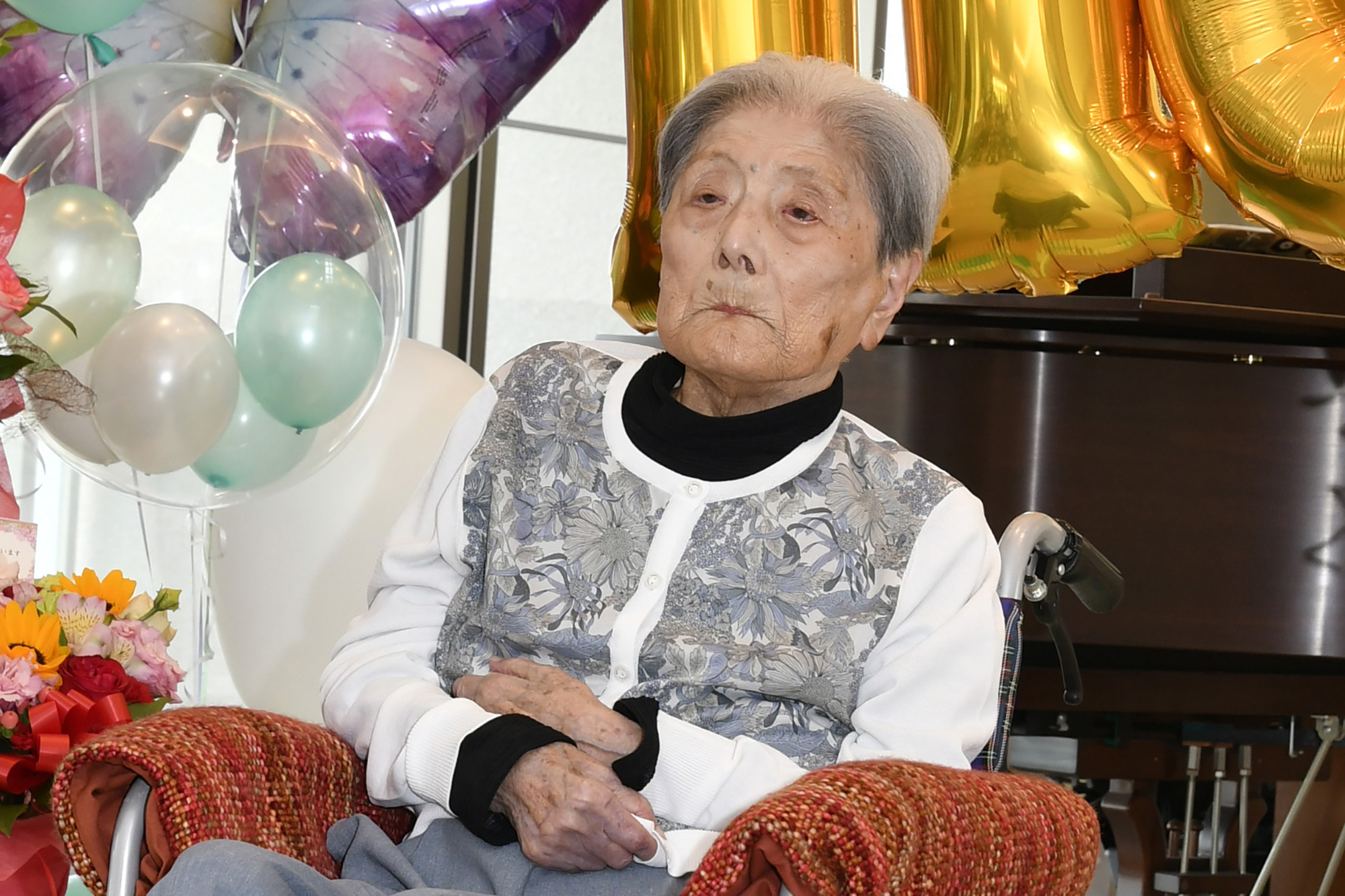 FILE - This photo provided by Ashiya City shows Tomiko Itooka, being celebrated for her 116th birthday at the nursing home she lives in Ashiya, western Japan, on May 23, 2024. (Ashiya City via AP, File)