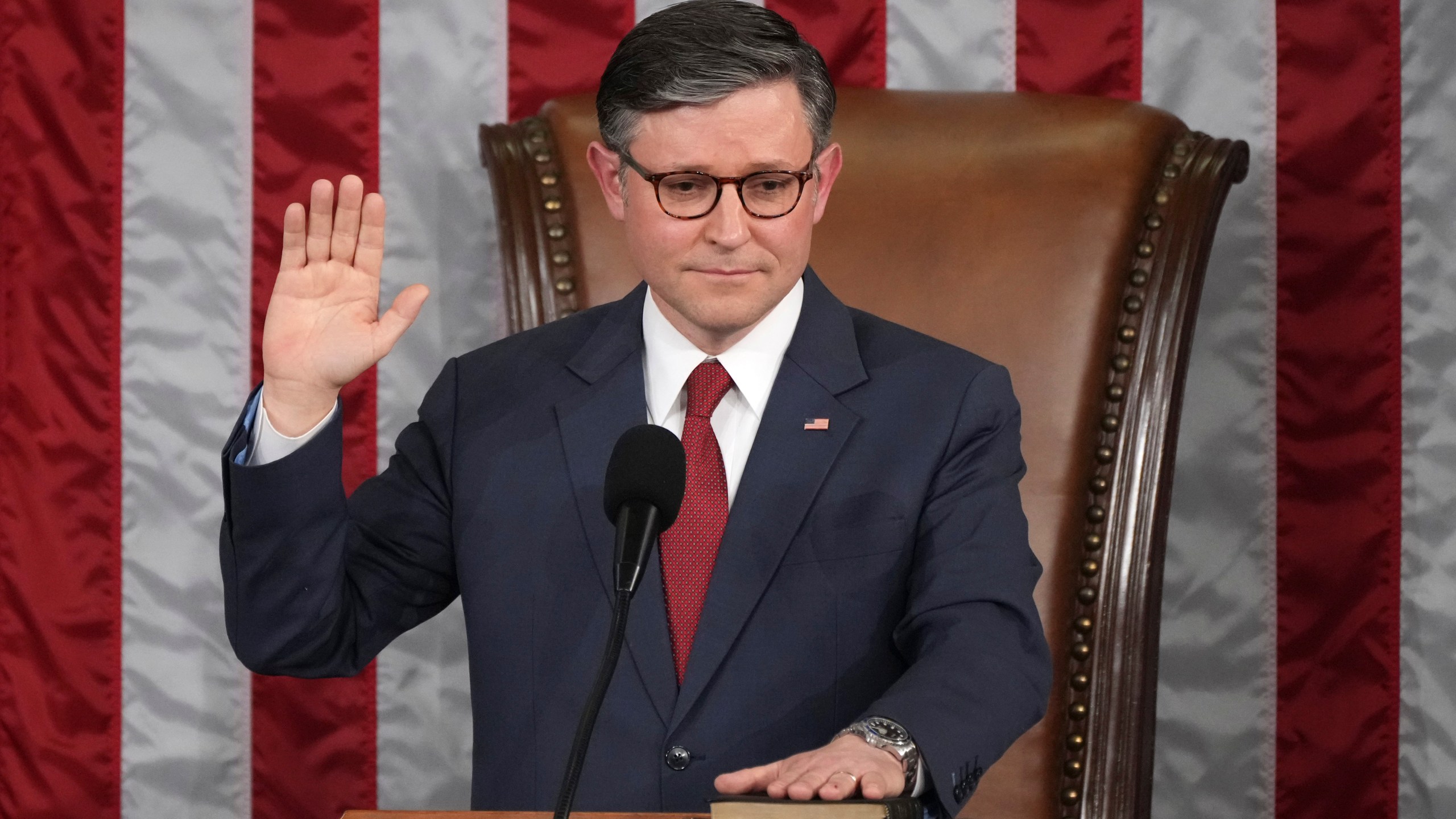 House Speaker Mike Johnson, R-La., takes the oath of office after being re-elected as the House of Representatives meets to elect a speaker and convene the new 119th Congress at the Capitol in Washington, Friday, Jan. 3, 2025. (AP Photo/Jacquelyn Martin)