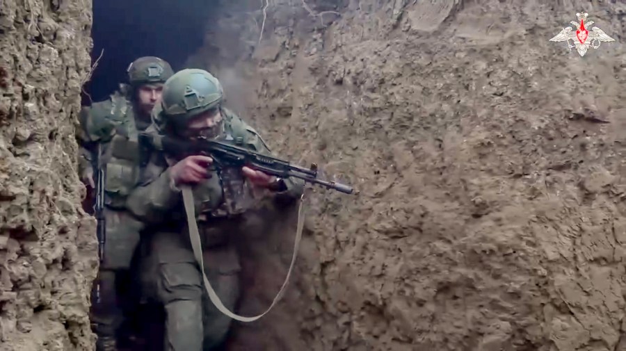 In this photo taken from video distributed by Russian Defense Ministry Press Service on Saturday, Jan. 4, 2025, Russian servicemen attend a combat training for assault units in an undisclosed location. (Russian Defense Ministry Press Service via AP)