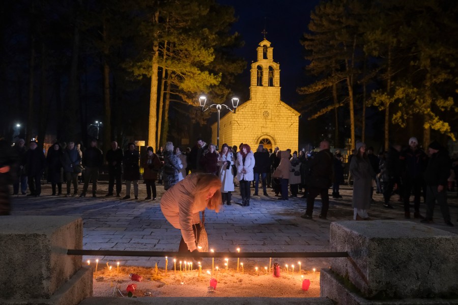 Several thousand people participated in a protest demanding the resignations of top security officials over a shooting earlier this week in Cetinje outside of Podogrica, Montenegro, Sunday, Jan. 5, 2025. (AP Photo/Risto Bozovic)