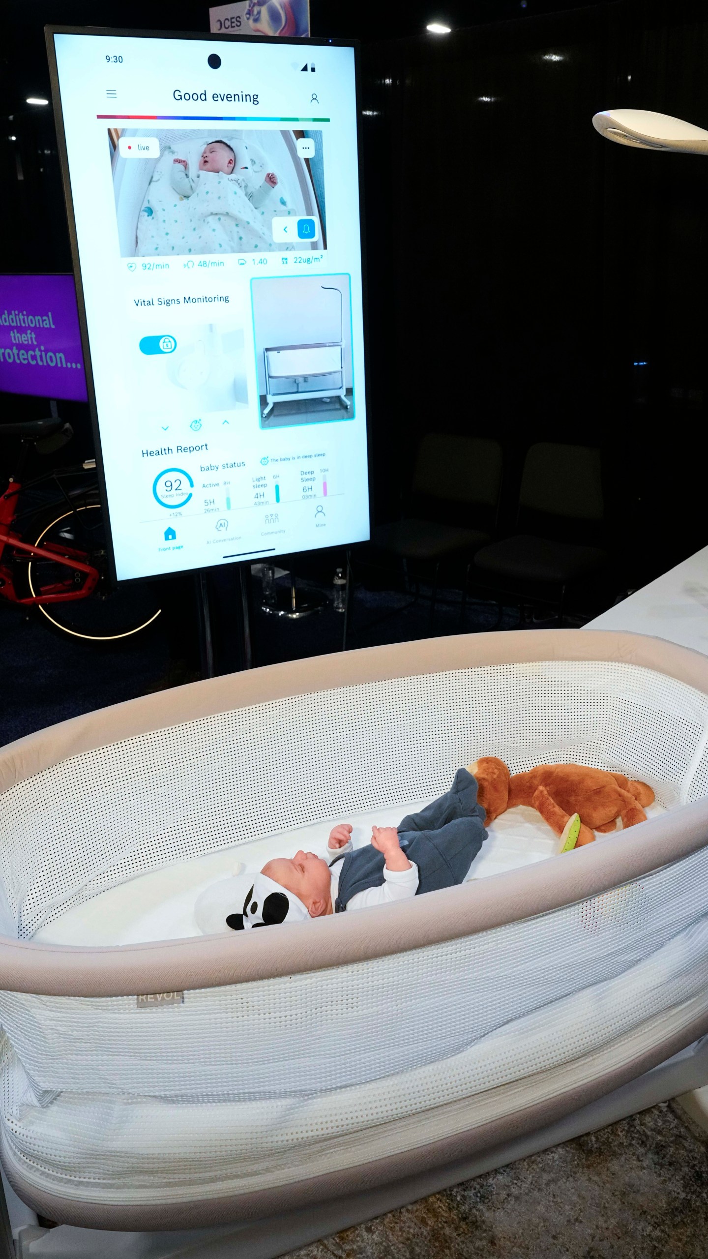 Bosch showcases the Revol Intelligent Crib, which monitors the baby's vital signs and can automatically rock if the baby is crying, during 2025 CES Unveiled, Sunday, Jan. 5, 2025, in Las Vegas. (AP Photo/Jack Dempsey)