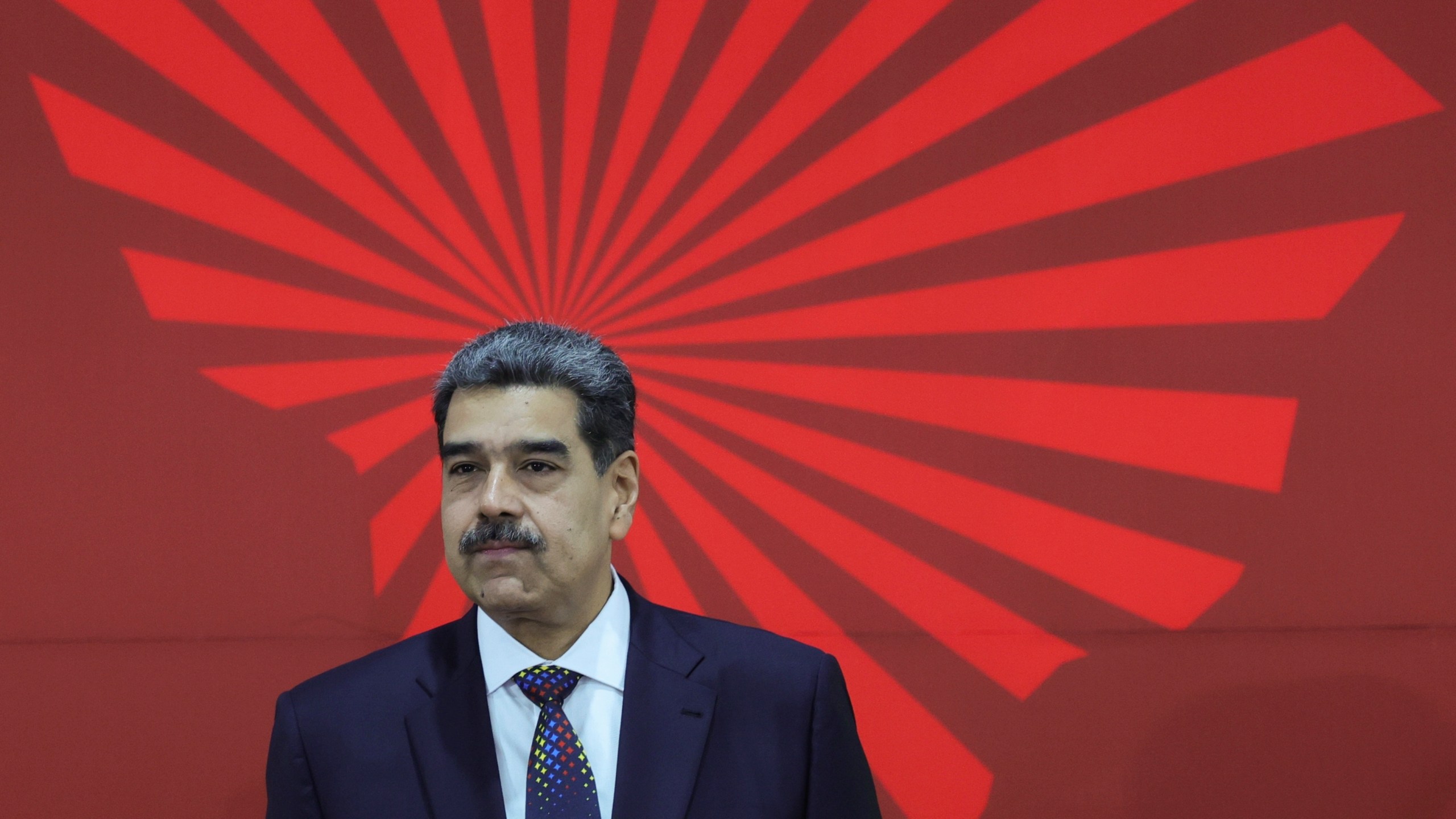 FILE - Venezuelan President Nicolas Maduro waits to receive attendees at the start of the Bolivarian Alliance for the Peoples of Our America (ALBA) Summit in Caracas, Venezuela, Dec. 14, 2024. (AP Photo/Jesus Vargas, File)