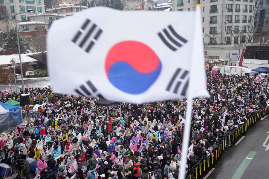 Supporters of impeached South Korean President Yoon Suk Yeol stage a rally to oppose his impeachment near the presidential residence in Seoul, South Korea, Sunday, Jan. 5, 2025. (AP Photo/Ahn Young-joon)