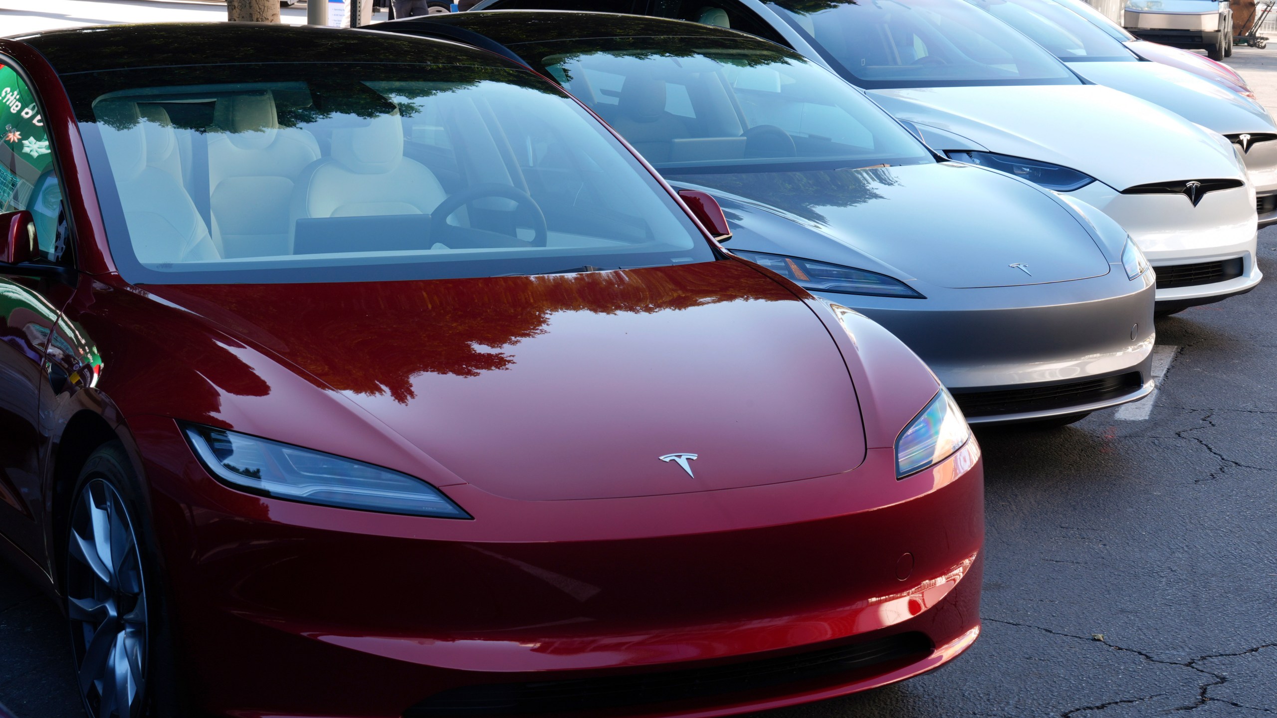 FILE - Tesla vehicles are displayed at the AutoMobility LA Auto Show, in Los Angeles, Nov. 21, 2024. (AP Photo/Damian Dovarganes, File)