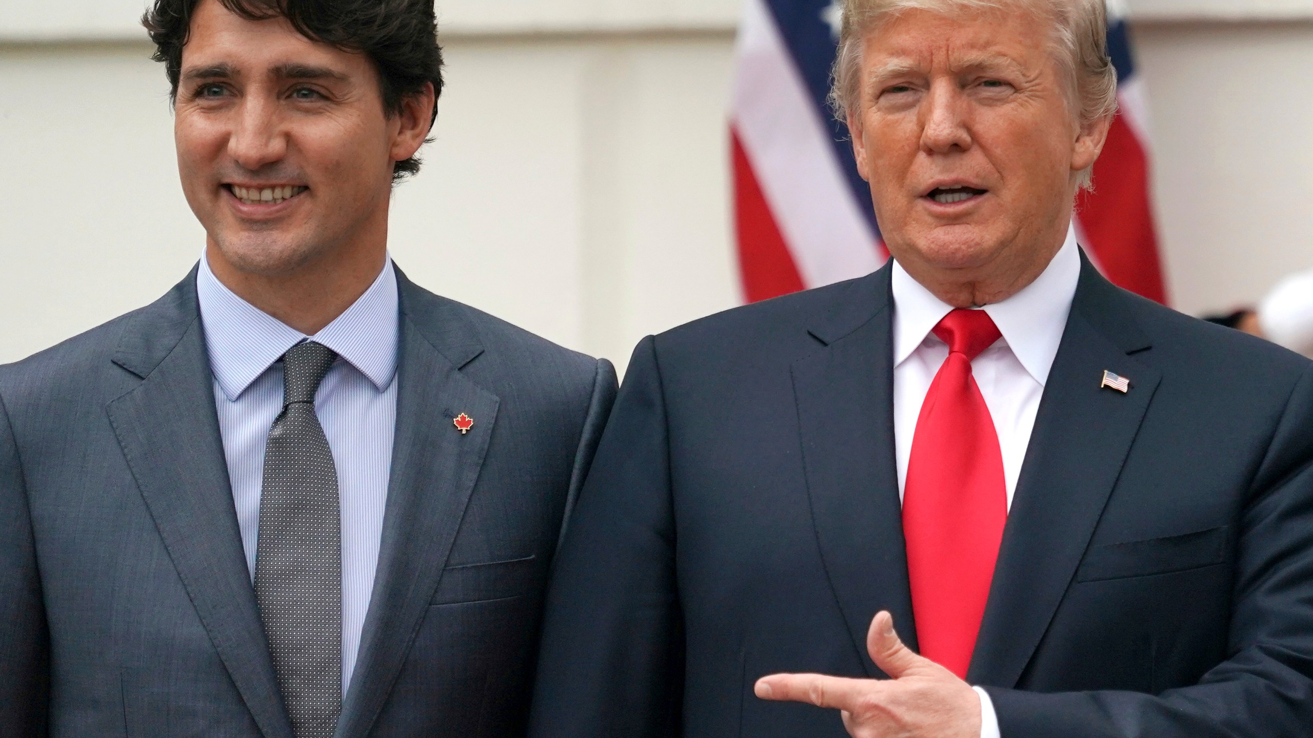 FILE - President Donald Trump and Canadian Prime Minister Justin Trudeau pose for a photo as Trudeau arrives at the White House in Washington, on Oct. 11, 2017. (AP Photo/Carolyn Kaster, File)