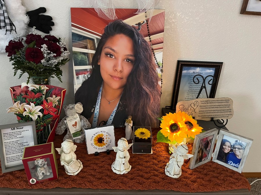 A photograph of Stephanie Cosme sits on an altar on Dec. 22, 2023, in Palmdale, Calif. (Paula Zamorano via AP)