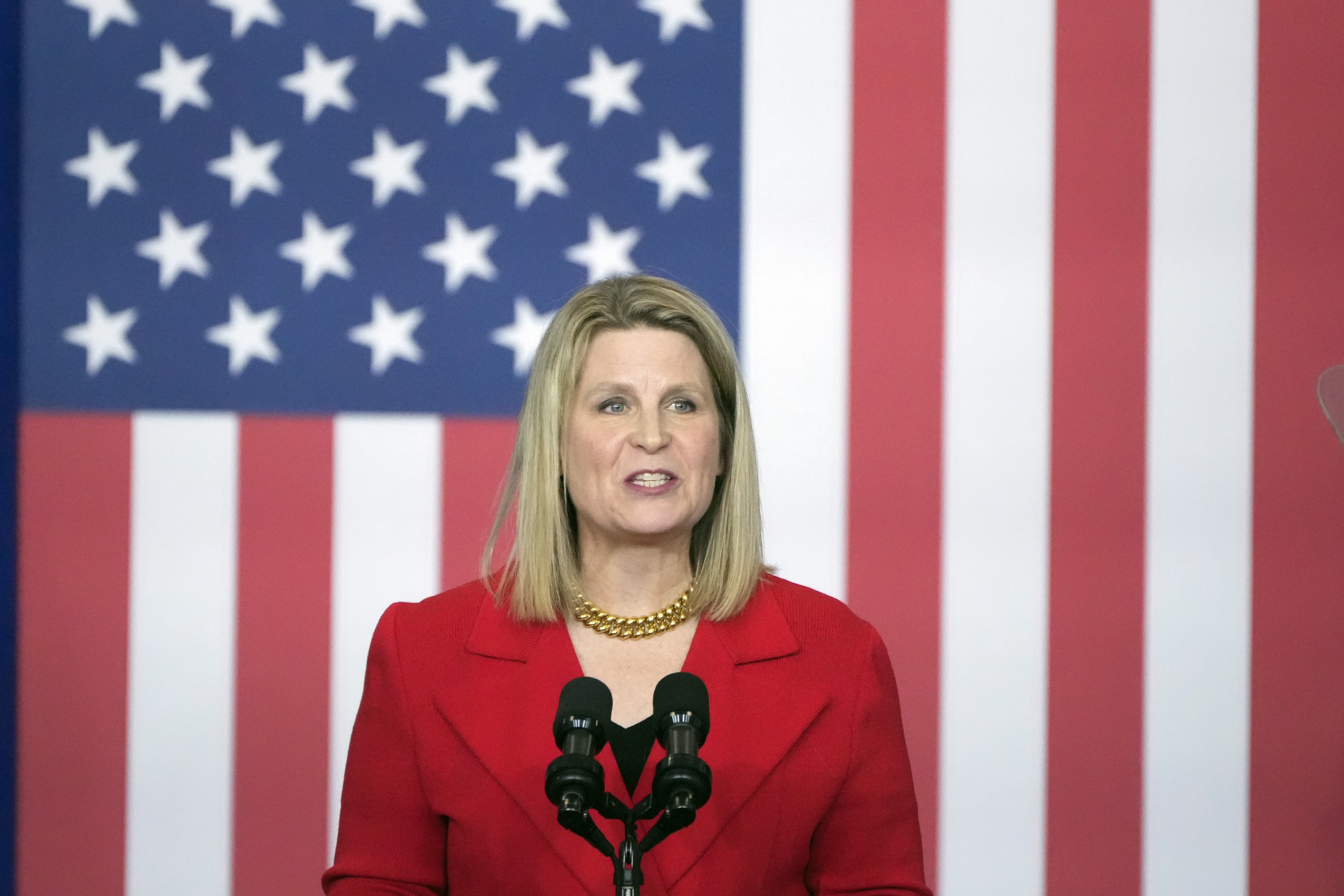 Elizabeth Shuler, president of the AFL-CIO, speaks before President Joe Biden arrives to speak at the Department of Labor in Washington, Monday, Dec. 16, 2024. (AP Photo/Mark Schiefelbein)