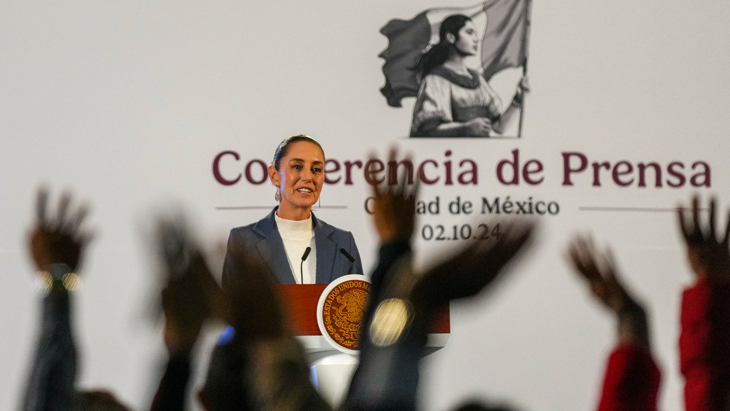 FILE - Mexican President Claudia Sheinbaum gives a media briefing at the National Palace in Mexico City, Oct. 2, 2024. (AP Photo/Fernando Llano, File)