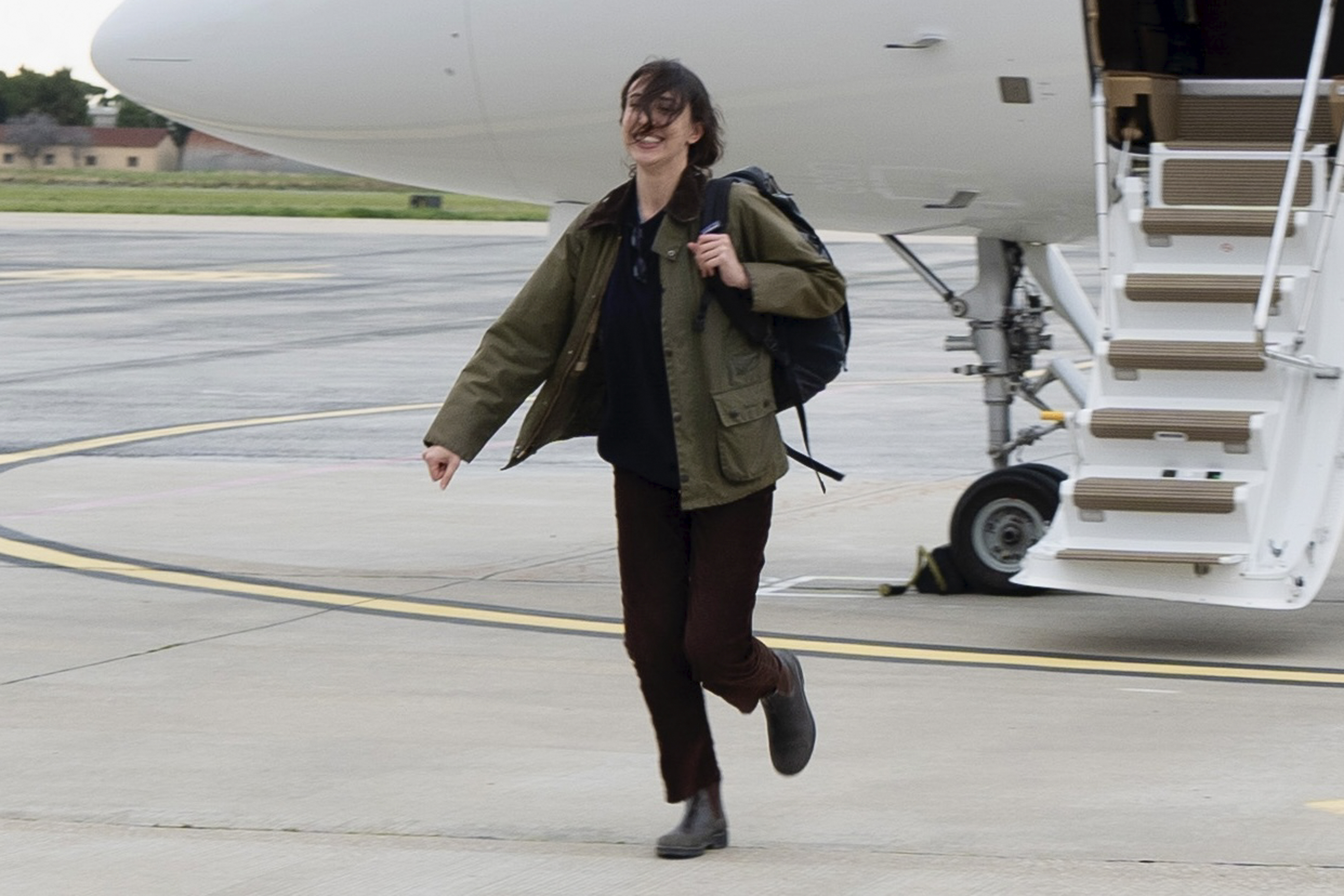 Cecilia Sala, an Italian journalist who was detained on Dec. 19 as she was reporting in Iran walks on the tarmac as she landed at Rome' Ciampino airport after being released, Wednesday, Jan. 8, 2025. (Filippo Attili, Italian Government Office via Ap )