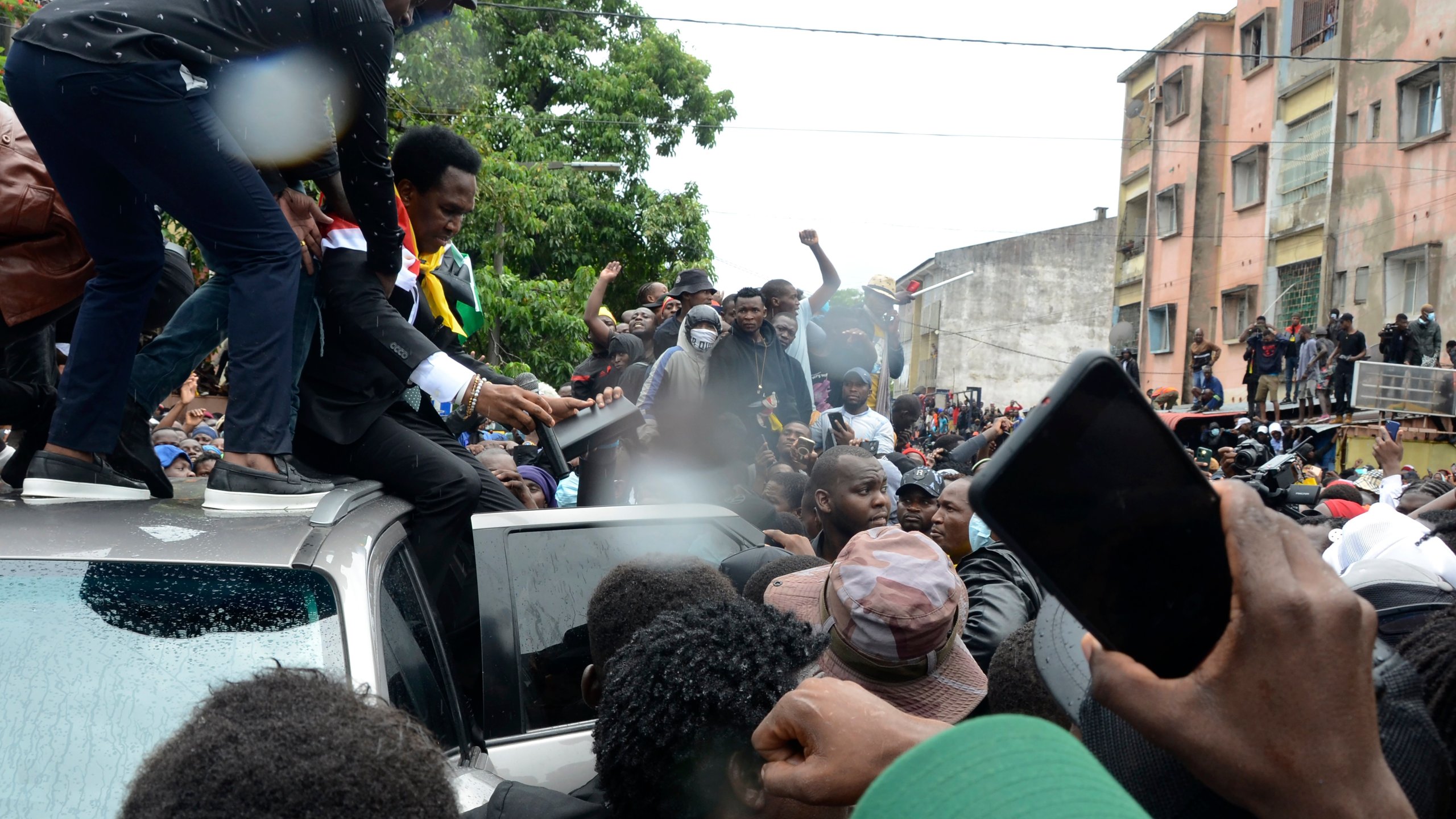 Mozambique's opposition leader Venancio Mondlane addresses supporters from the top of a vehicle on the street in Maputo, Mozambique, Thursday, Jan. 9, 2025. (AP Photo/Carlos Uqueio)