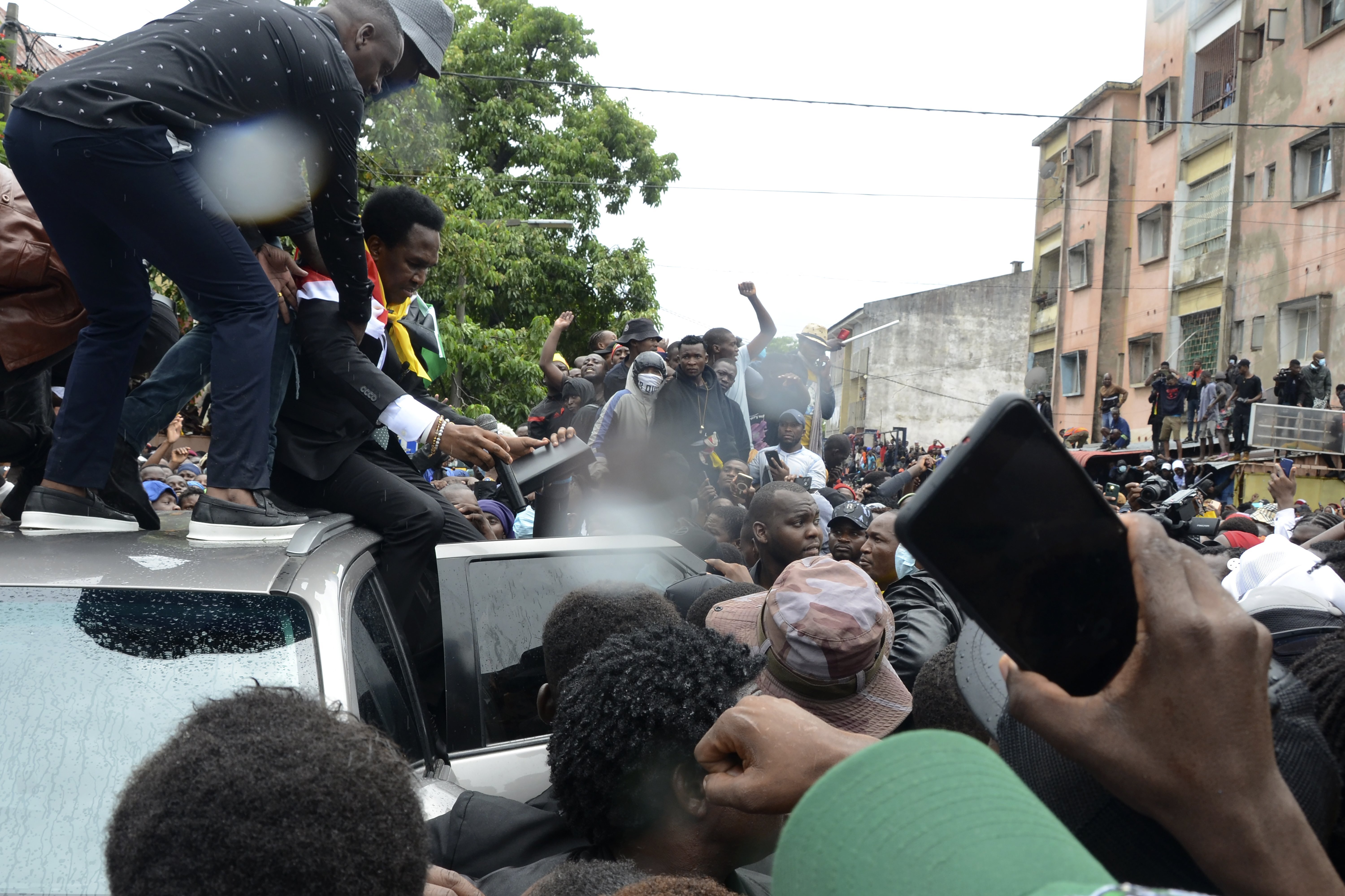 Mozambique's opposition leader Venancio Mondlane addresses supporters from the top of a vehicle on the street in Maputo, Mozambique, Thursday, Jan. 9, 2025. (AP Photo/Carlos Uqueio)