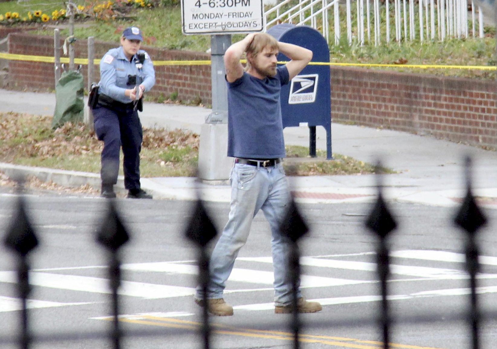 FILE - Edgar Maddison Welch, of Salisbury, N.C., surrenders to police, in Washington, Dec. 4, 2016. (Sathi Soma via AP, File)