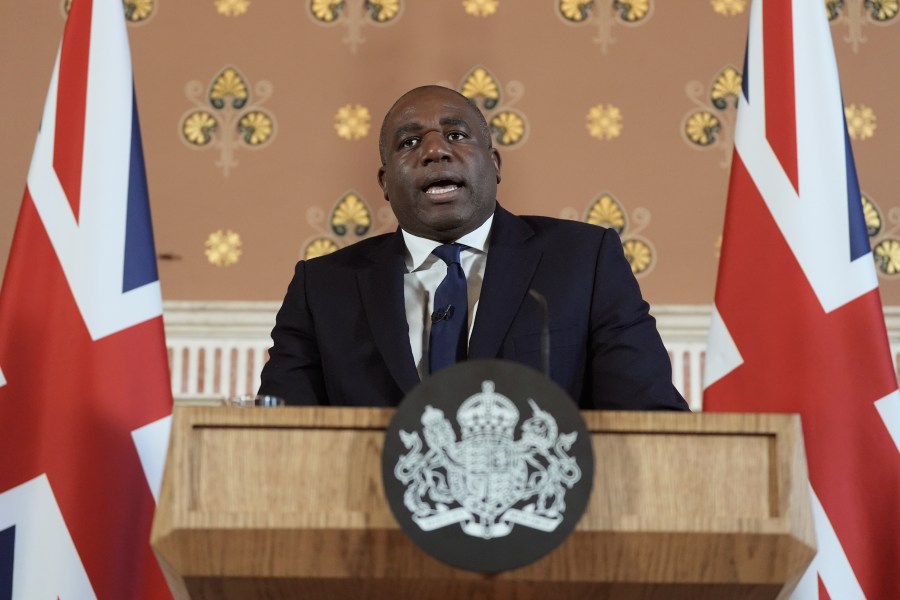 Britain's Foreign Secretary David Lammy delivers a speech on the government plans for new sanctions which will target the finances of people smuggling networks as part of efforts to stop migrants crossing the English Channel, in London, Thursday, Jan. 9, 2025. (Stefan Rousseau/Pool Photo via AP)