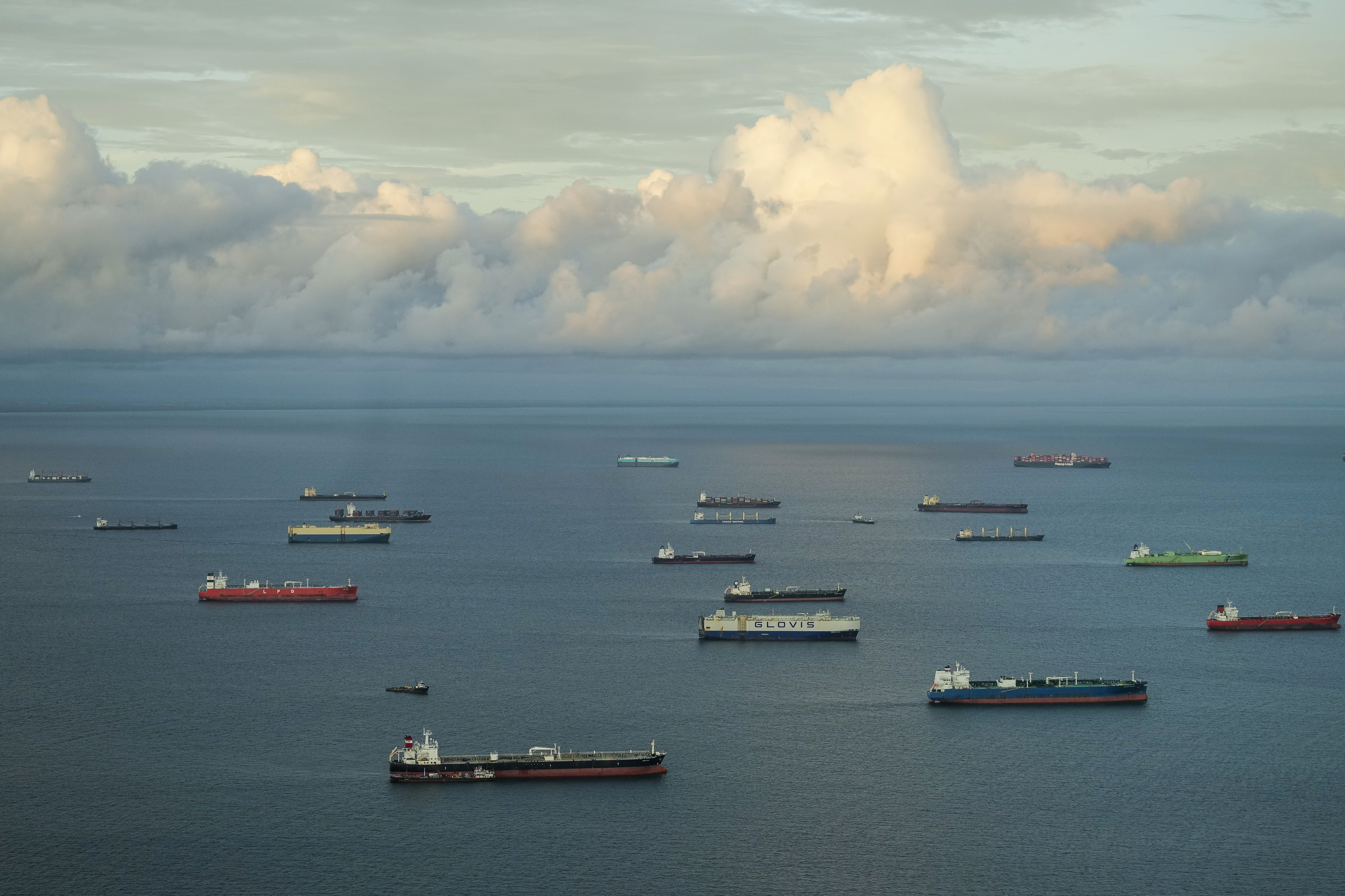 FILE - Cargo ships wait to transit the Panama Canal in Panama City, on June 28, 2024. (AP Photo/Matias Delacroix, File)