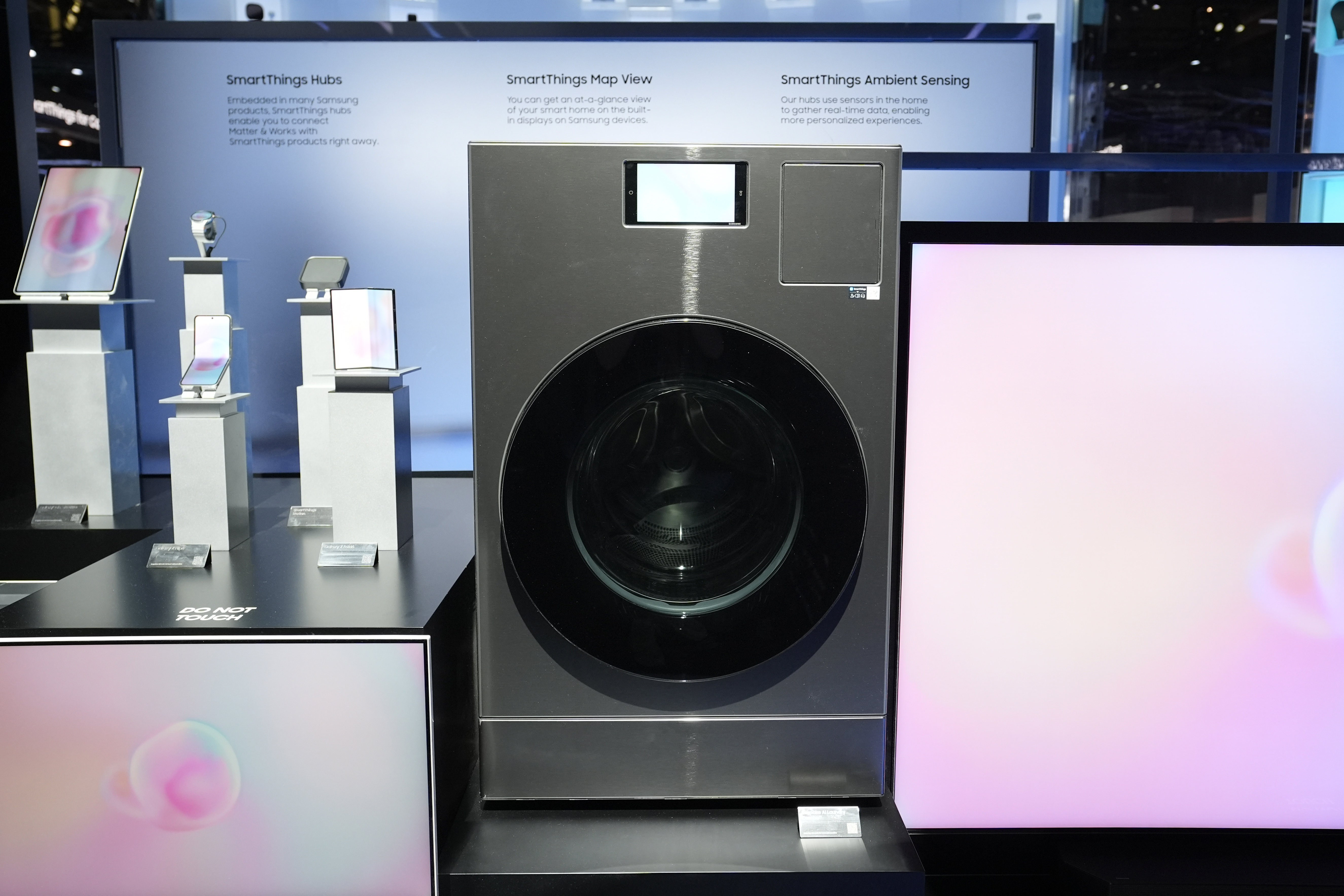 The Samsung Bespoke AI Washing Machine is displayed at a Samsung booth during the CES tech show Wednesday, Jan. 8, 2025, in Las Vegas. (AP Photo/Abbie Parr)