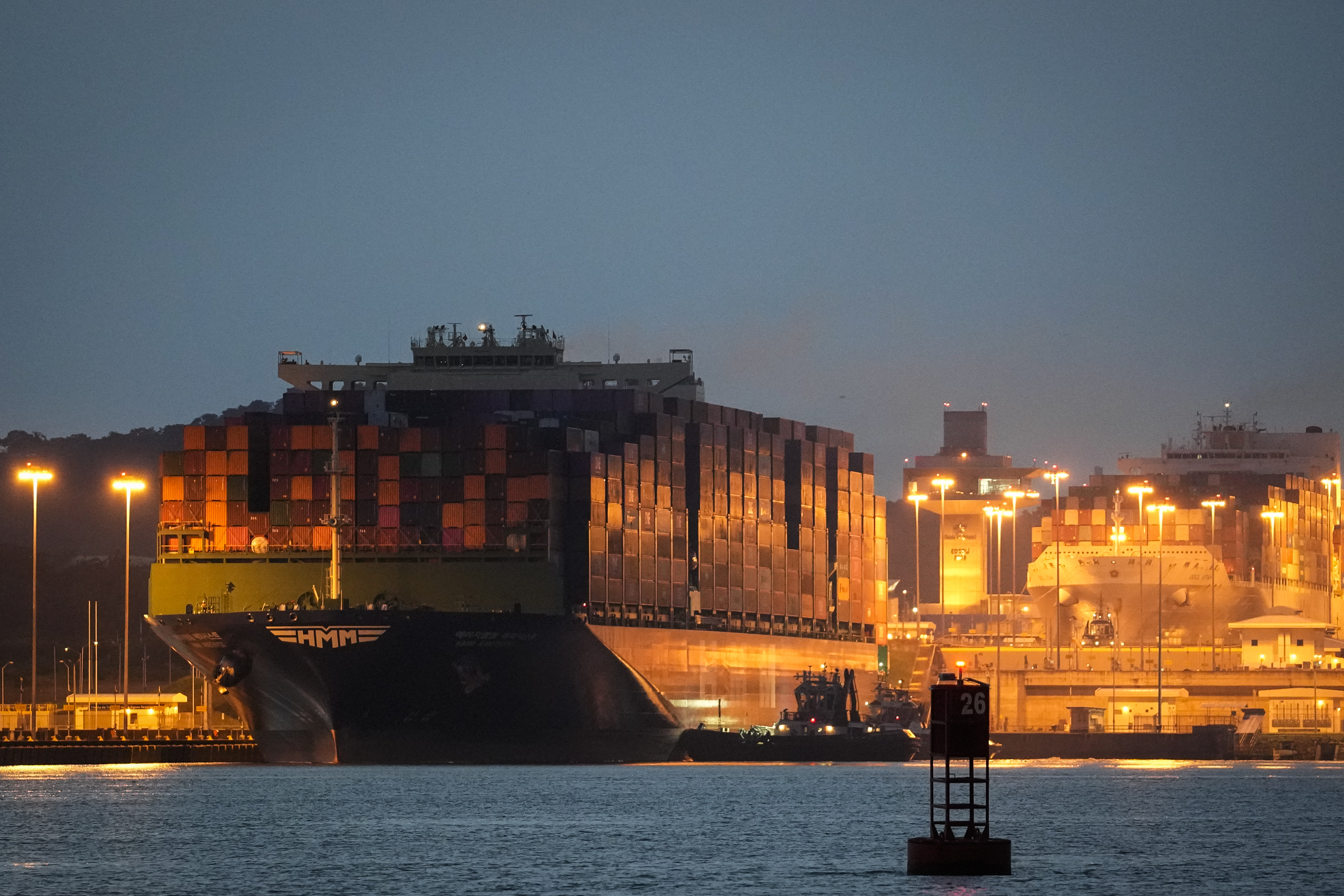 FILE - A cargo ship sails through the Miraflores locks of the Panama Canal, in Panama City, on Sept. 9, 2024. (AP Photo/Matias Delacroix, File)