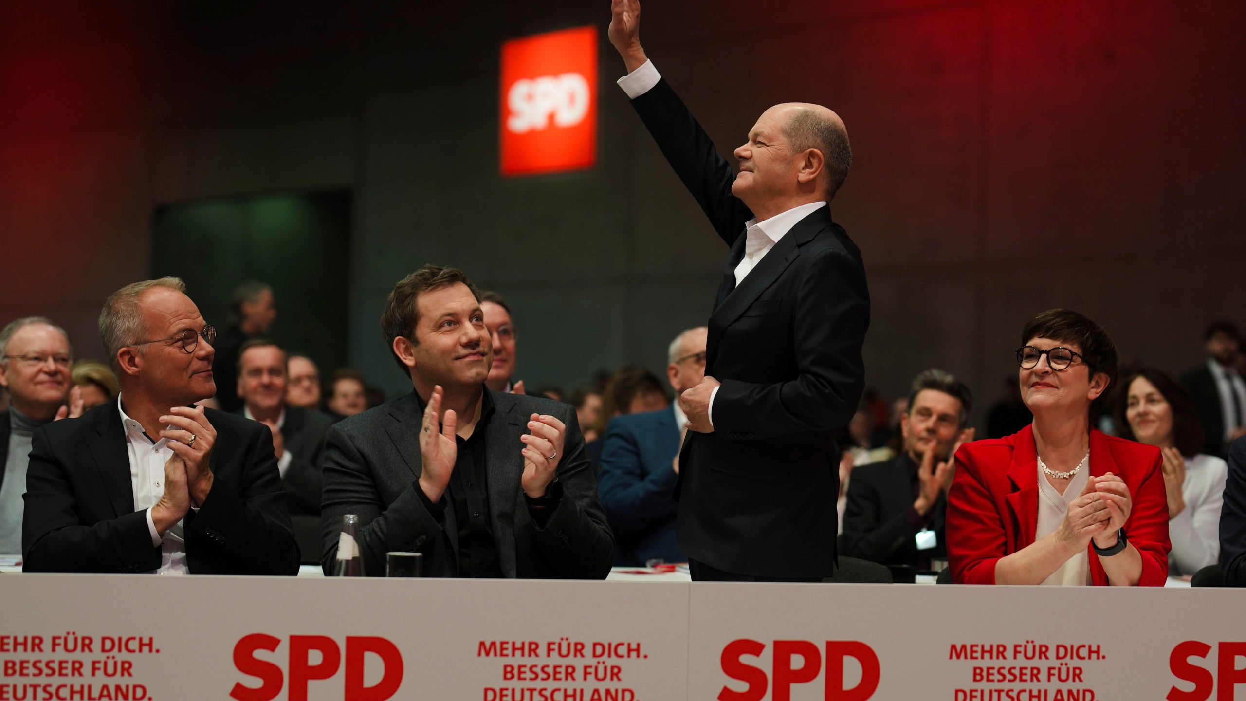 German Chancellor Olaf Scholz waves as he arrives at a special party convention of the Social Democratic Party, SPD, in Berlin, Germany, Saturday, Jan. 11, 2025. (AP Photo/Markus Schreiber)