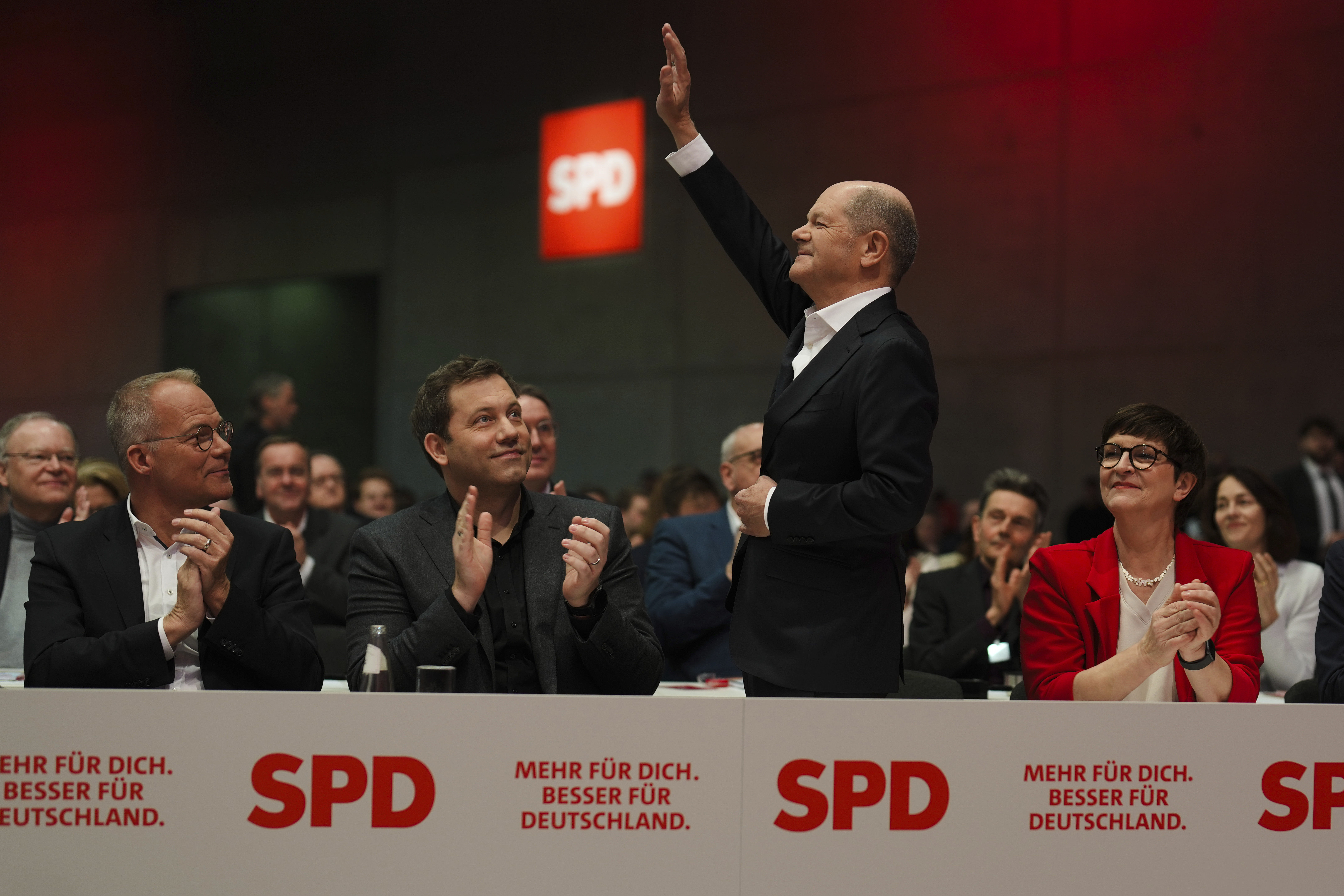 German Chancellor Olaf Scholz waves as he arrives at a special party convention of the Social Democratic Party, SPD, in Berlin, Germany, Saturday, Jan. 11, 2025. (AP Photo/Markus Schreiber)