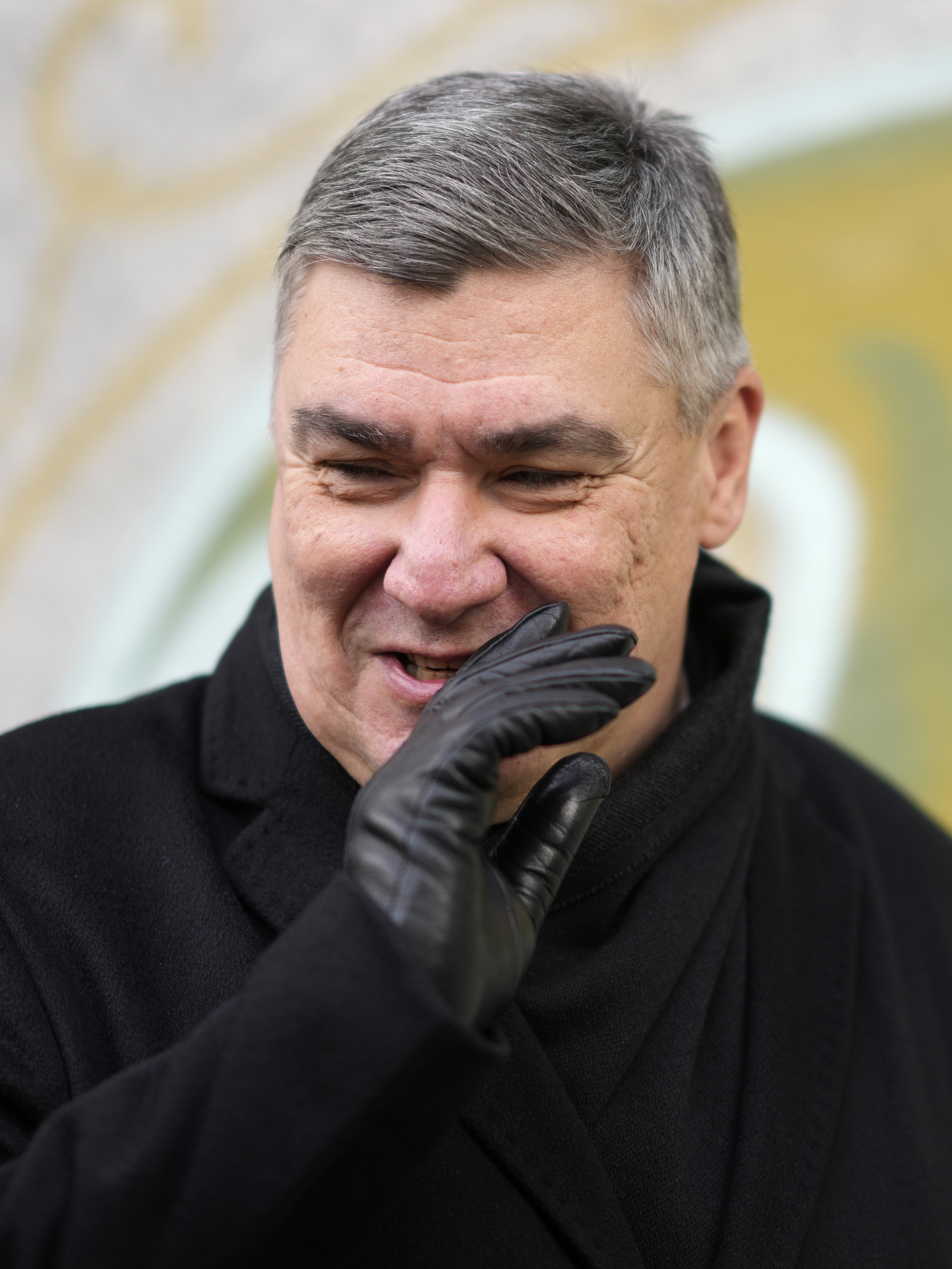 President incumbent Zoran Milanovic talks to media after casting his ballot during a runoff vote for the Croatian presidential election at a polling station in Zagreb, Croatia, Sunday, Jan. 12, 2025. (AP Photo/Darko Bandic)