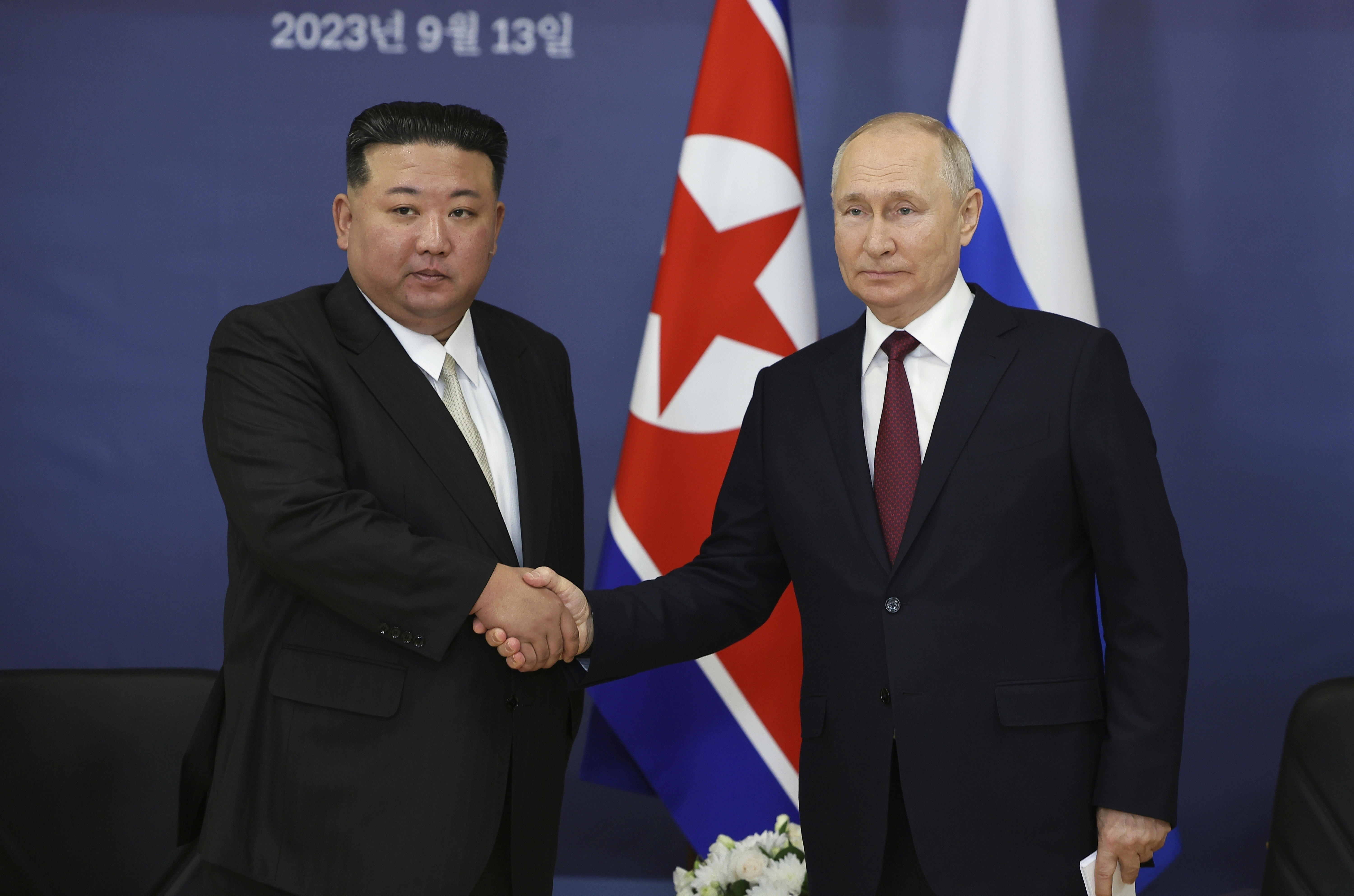 FILE - Russian President Vladimir Putin, right, and North Korean leader Kim Jong Un shake hands during their meeting at the Vostochny cosmodrome outside of Tsiolkovsky, in the far eastern Amur region, Russia on Sept. 13, 2023. (Vladimir Smirnov/Sputnik Kremlin Pool Photo via AP, File)