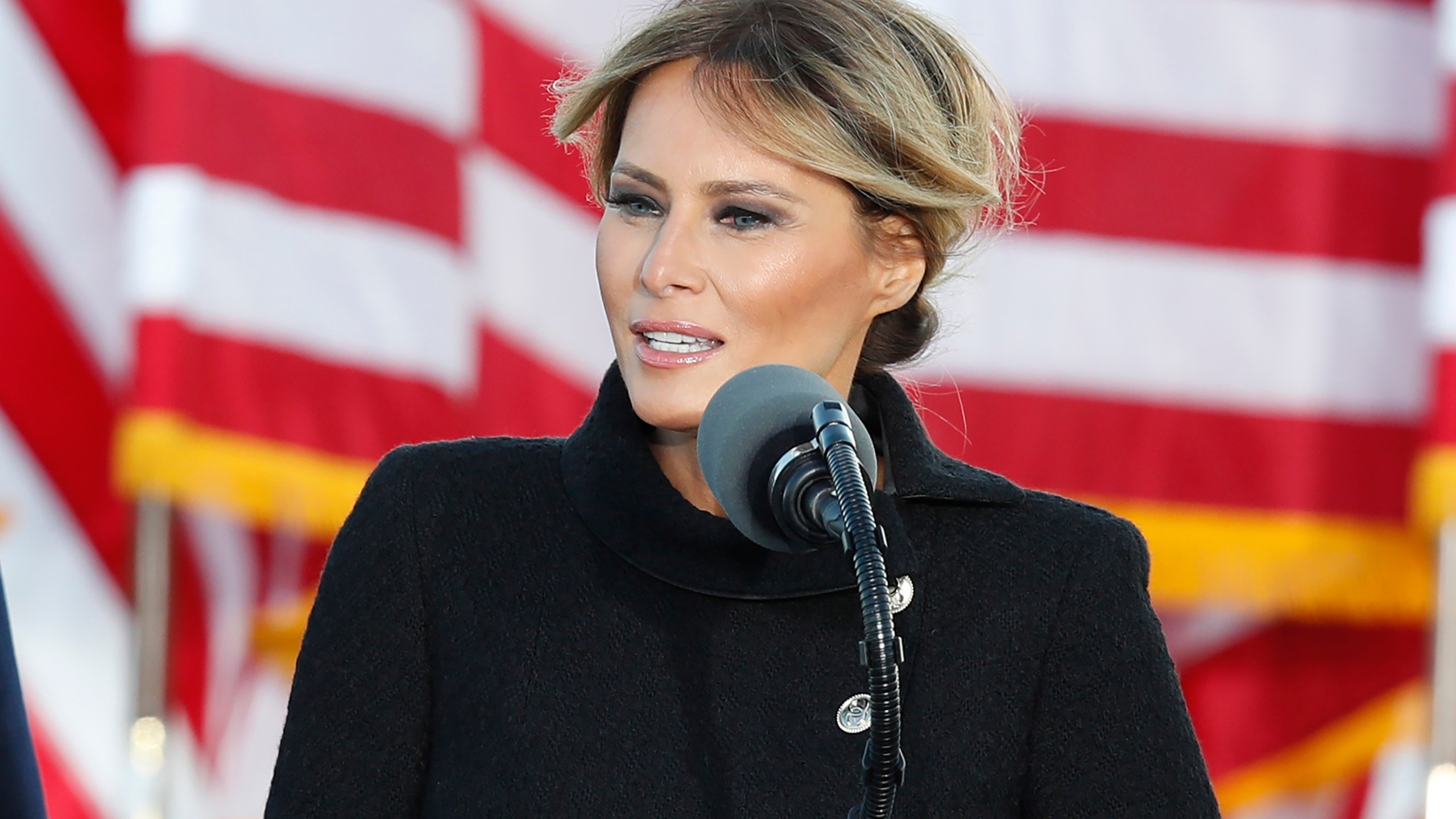 FILE - First lady Melania Trump speaks to a small group of supporters at Andrews Air Force Base, Md., Jan. 20, 2021. (AP Photo/Luis M. Alvarez, File)