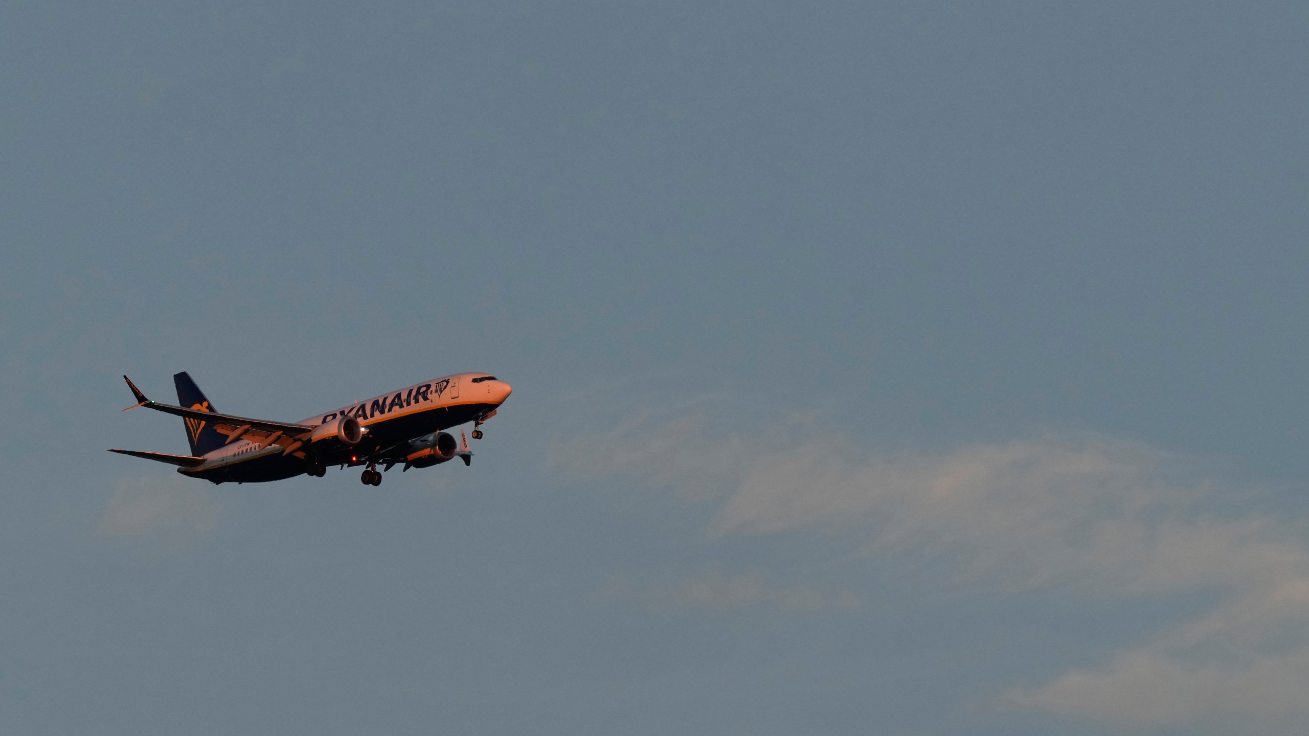 FILE - A Ryanair Boeing 737 MAX 8 approaches for landing in Lisbon at sunrise, Sunday, June 23, 2024. (AP Photo/Armando Franca, File)