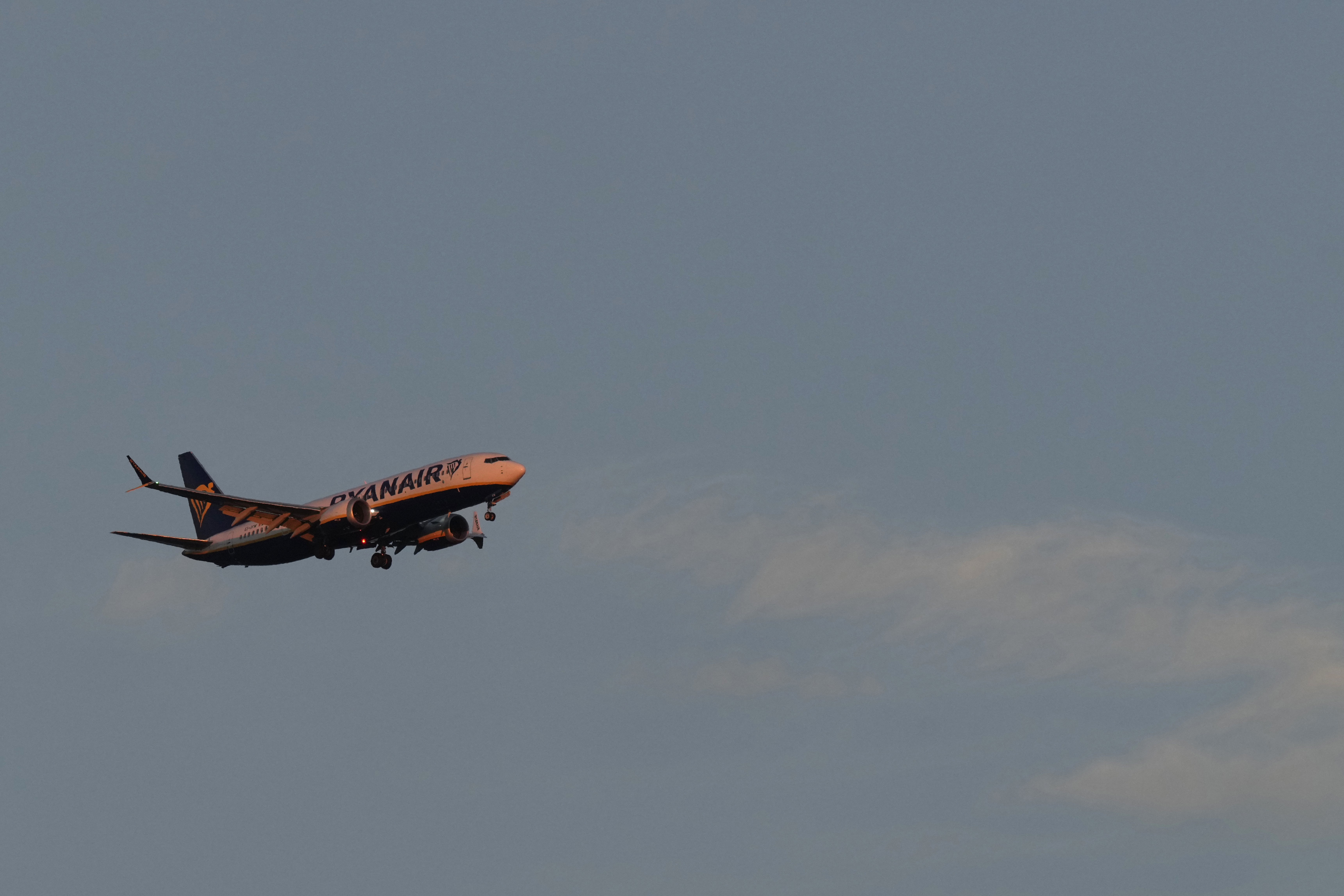 FILE - A Ryanair Boeing 737 MAX 8 approaches for landing in Lisbon at sunrise, Sunday, June 23, 2024. (AP Photo/Armando Franca, File)