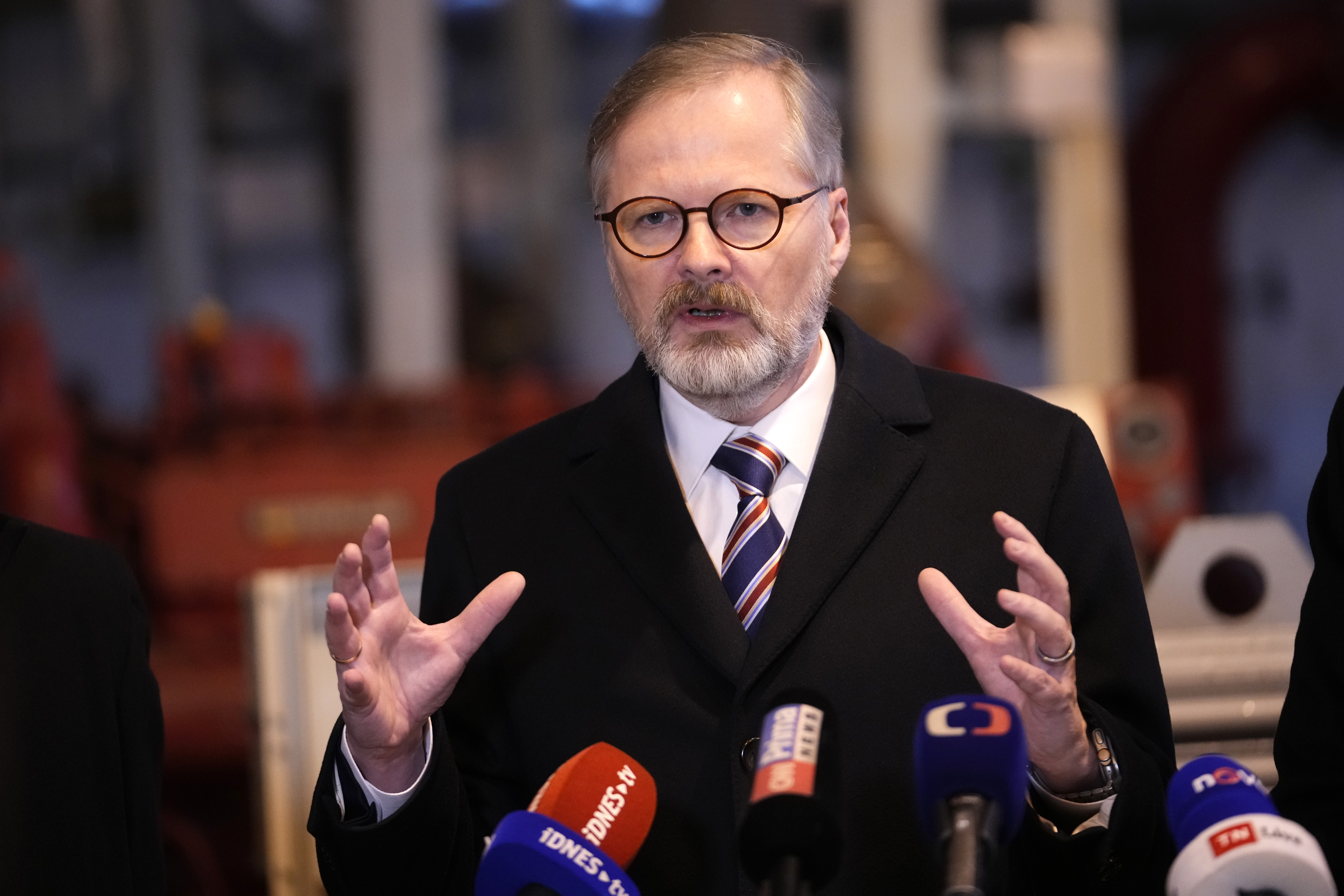 Czech Republic's Prime Minister Petr Fialla addresses media at the Central Oil Tank Farm near Nelahozeves, Czech Republic, Tuesday, Jan. 14, 2025. (AP Photo/Petr David Josek)