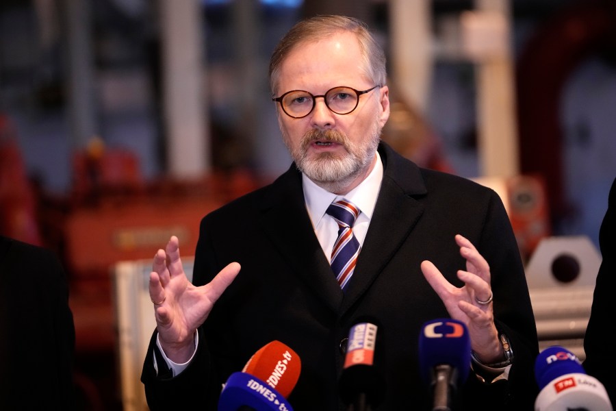 Czech Republic's Prime Minister Petr Fialla addresses media at the Central Oil Tank Farm near Nelahozeves, Czech Republic, Tuesday, Jan. 14, 2025. (AP Photo/Petr David Josek)