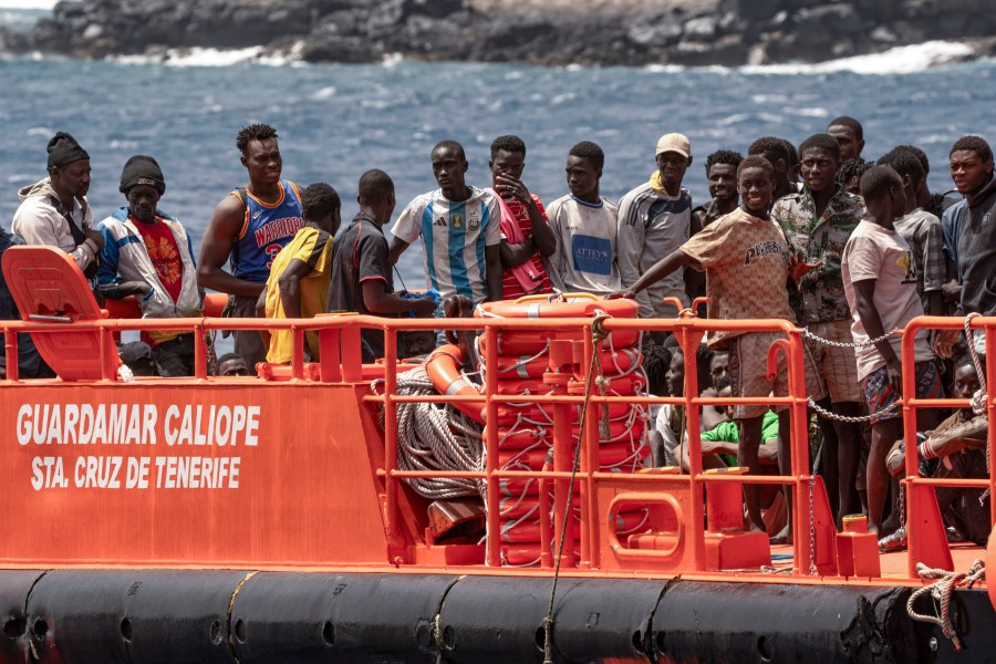 FILE - Migrants disembark at the port of on "La Estaca" in Valverde at the Canary island of El Hierro, Spain, Aug. 26, 2024. (AP Photo/Maria Ximena, file)