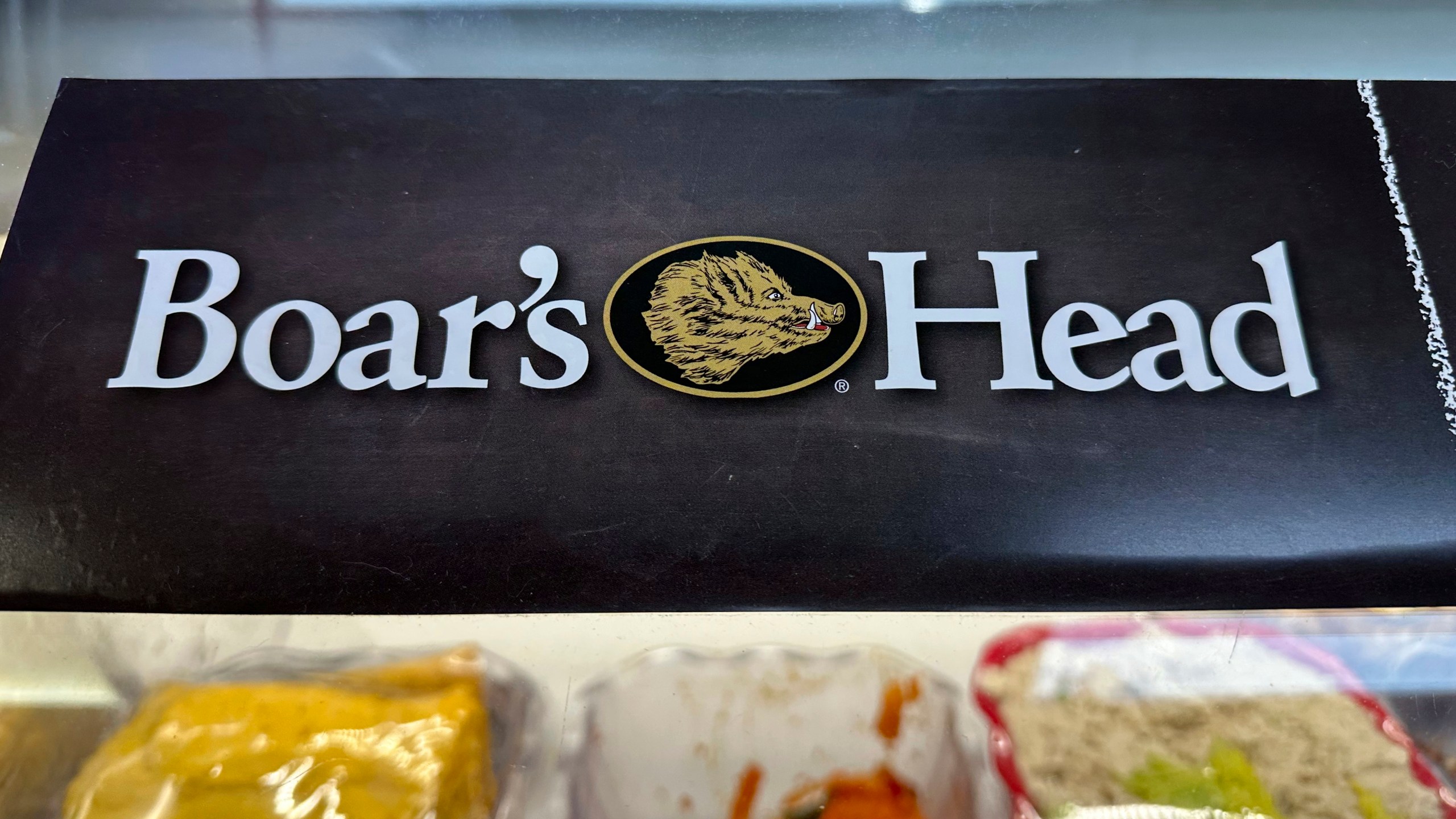 FILE - A Boar's Head logo is seen at a bodega in New York, Aug. 30, 2024. (AP Photo/Stephanie Nano, File)