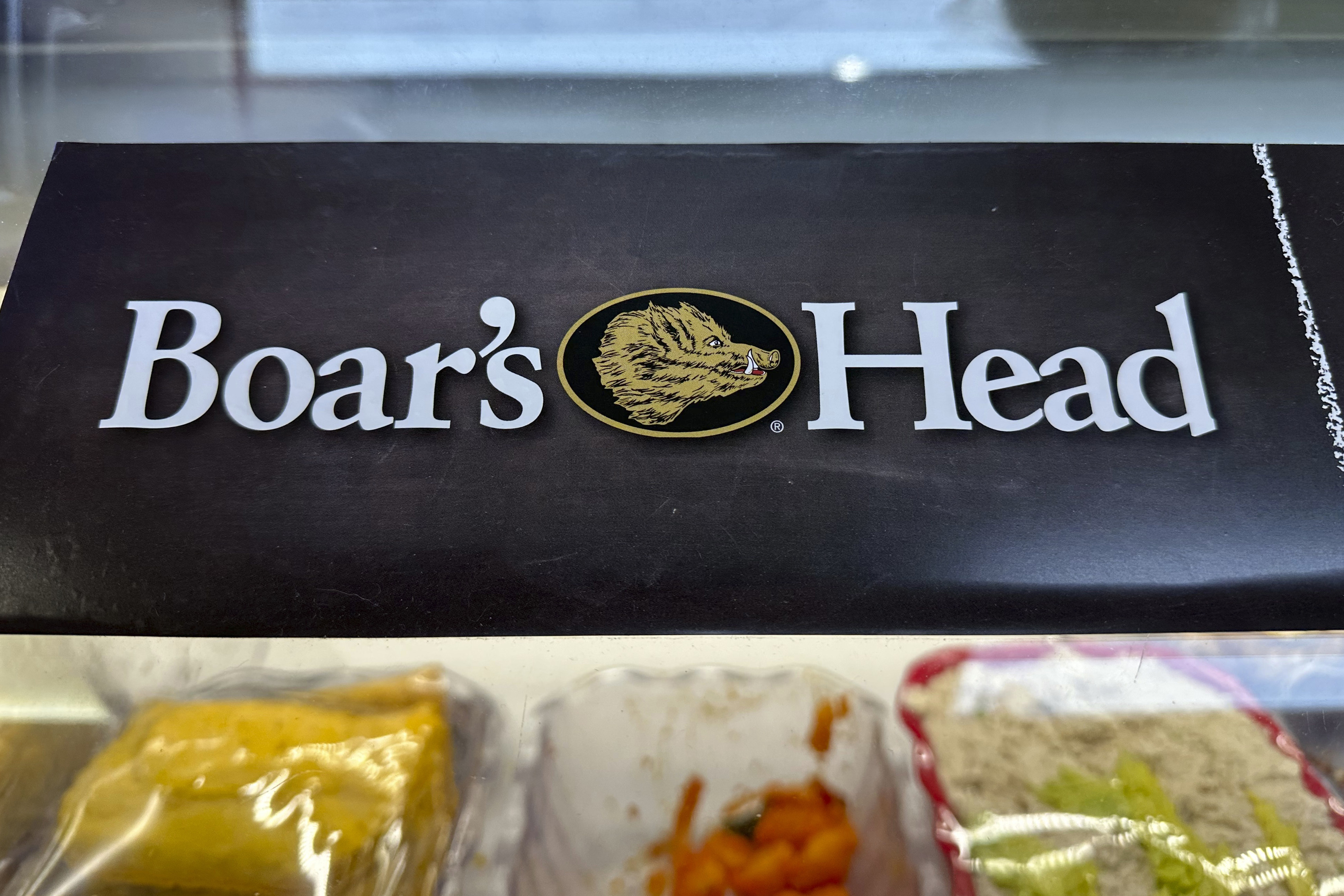 FILE - A Boar's Head logo is seen at a bodega in New York, Aug. 30, 2024. (AP Photo/Stephanie Nano, File)