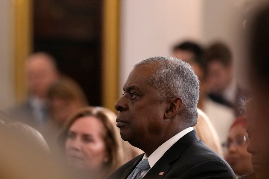 Defense Secretary Lloyd Austin listens as President Joe Biden speaks about foreign policy during a speech at the State Department in Washington, Monday, Jan. 13, 2025. (AP Photo/Susan Walsh)