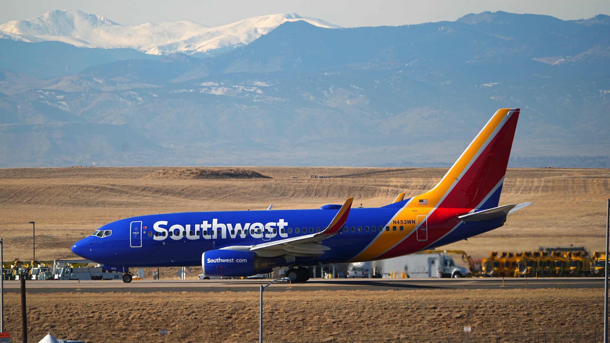 Southwest Airlines jetliner taxis down a runway for take off at Denver International Airport, Tuesday, Dec. 24, 2024, in Denver. (AP Photo/David Zalubowski)