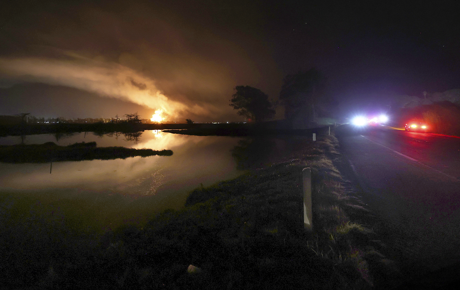 Flames and smoke from a fire fill the sky at the Moss Landing Power Plant Thursday Jan. 16, 2025 in Moss Landing, Calif. (Shmuel Thaler /The Santa Cruz Sentinel via AP)