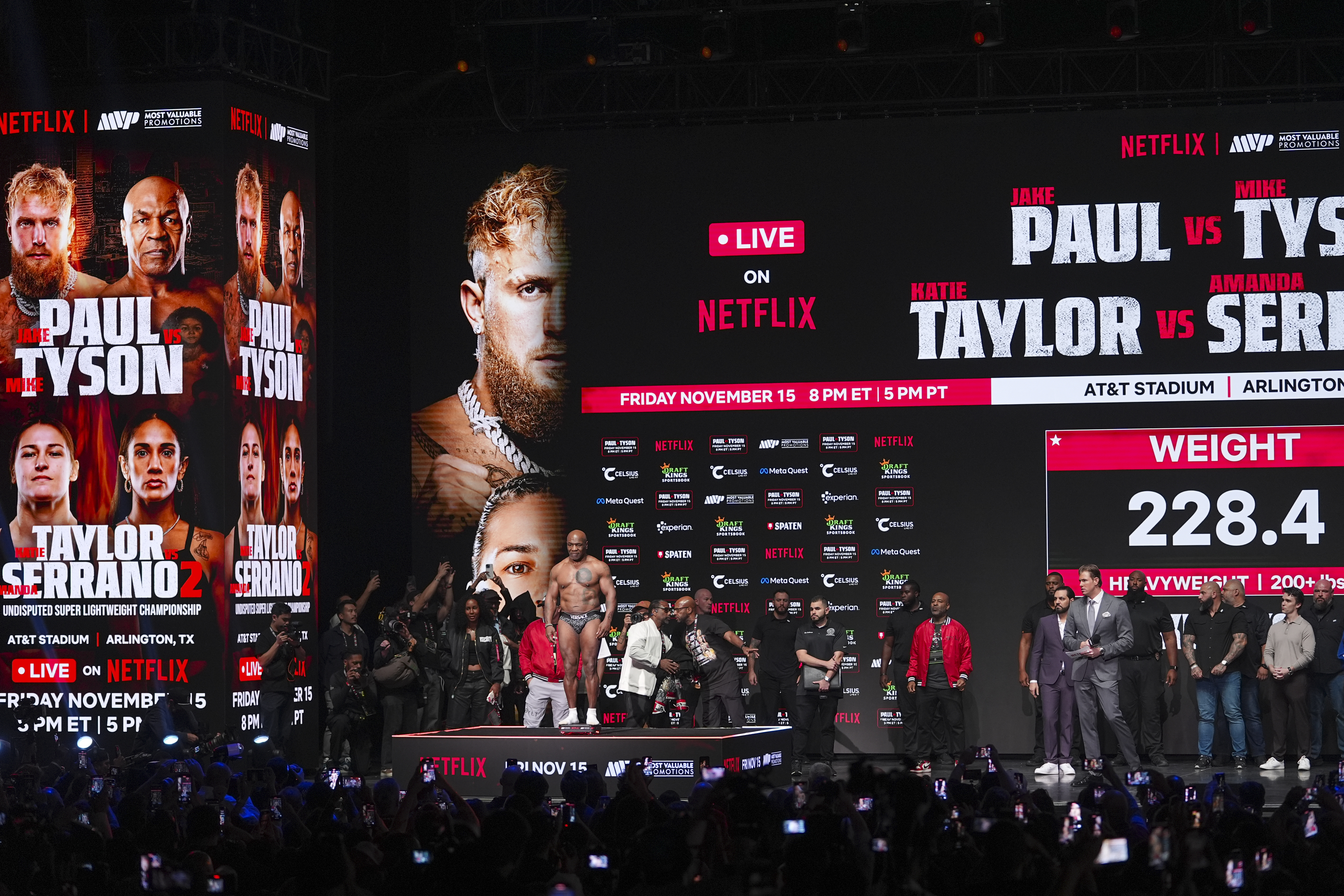 FILE - Mike Tyson steps on the scale during a weigh-in ahead of his heavyweight bout against Jake Paul, in Irving, Texas, in Irving, Texas. (AP Photo/Julio Cortez, File)