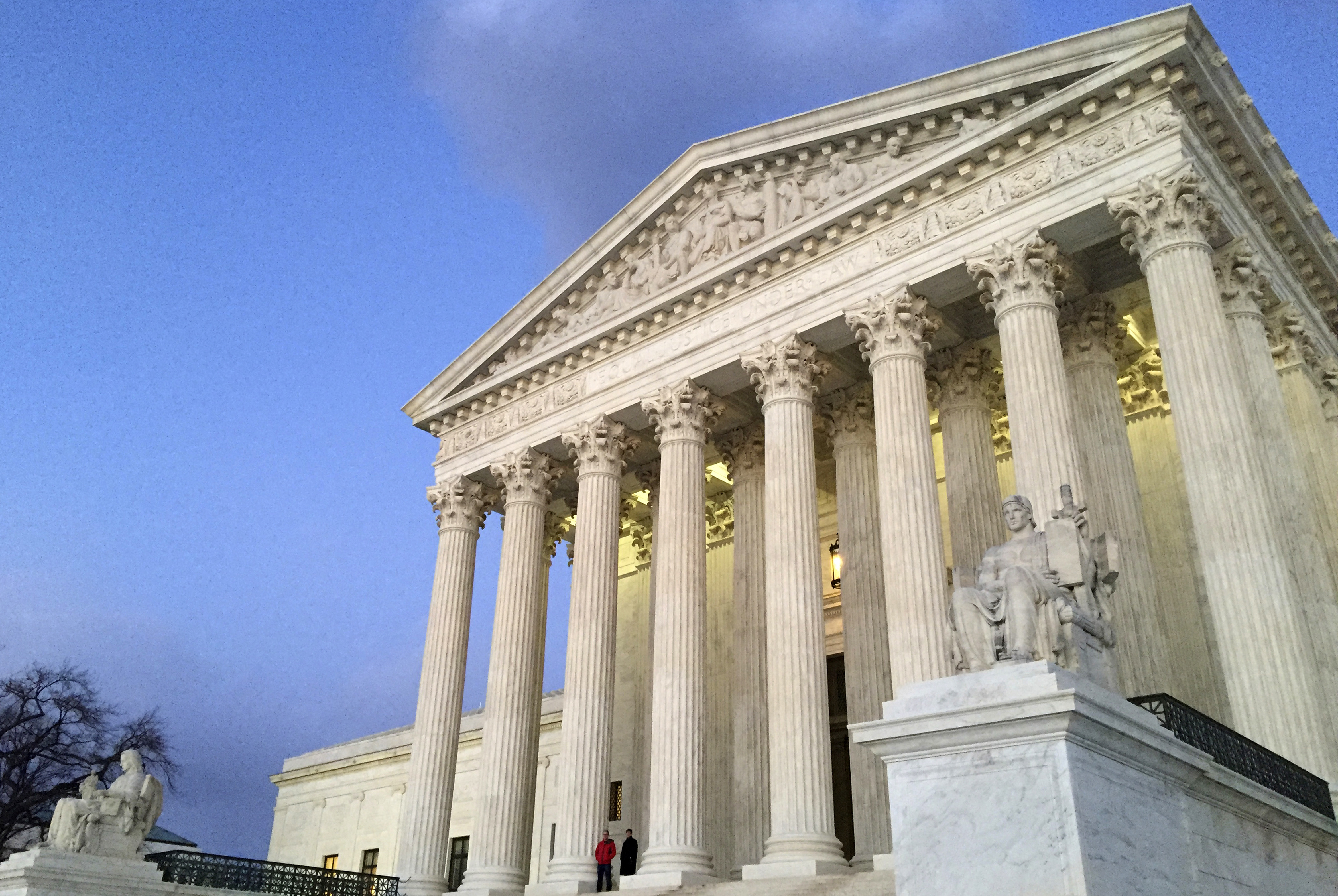 FILE - The Supreme Court at sunset in Washington, Feb. 13, 2016. (AP Photo/Jon Elswick, File)