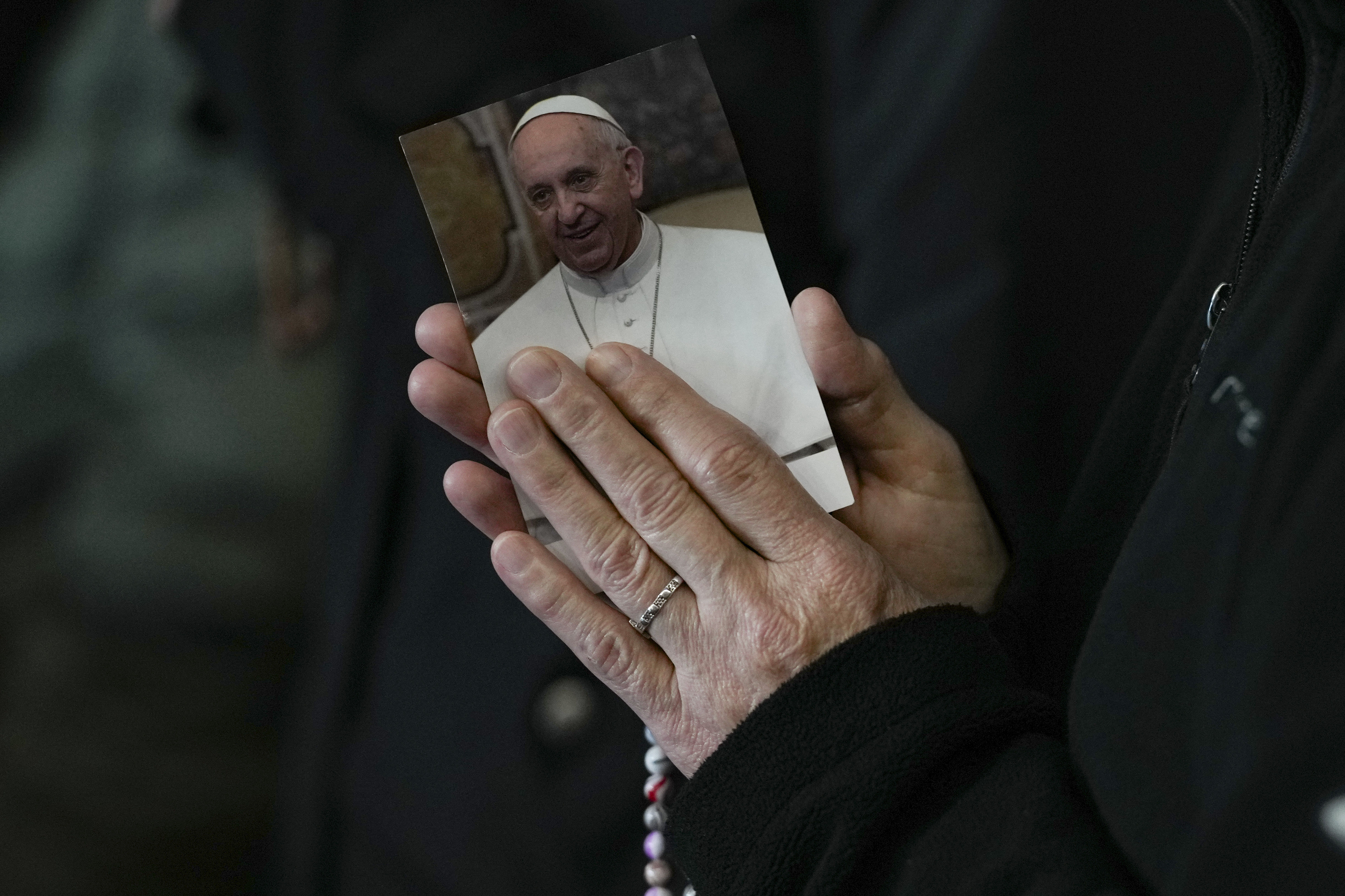 A nun attends a Rosary prayer for Pope Francis, in St. Peter's Square at the Vatican, Monday, March 10, 2025. (AP Photo/Andrew Medichini)